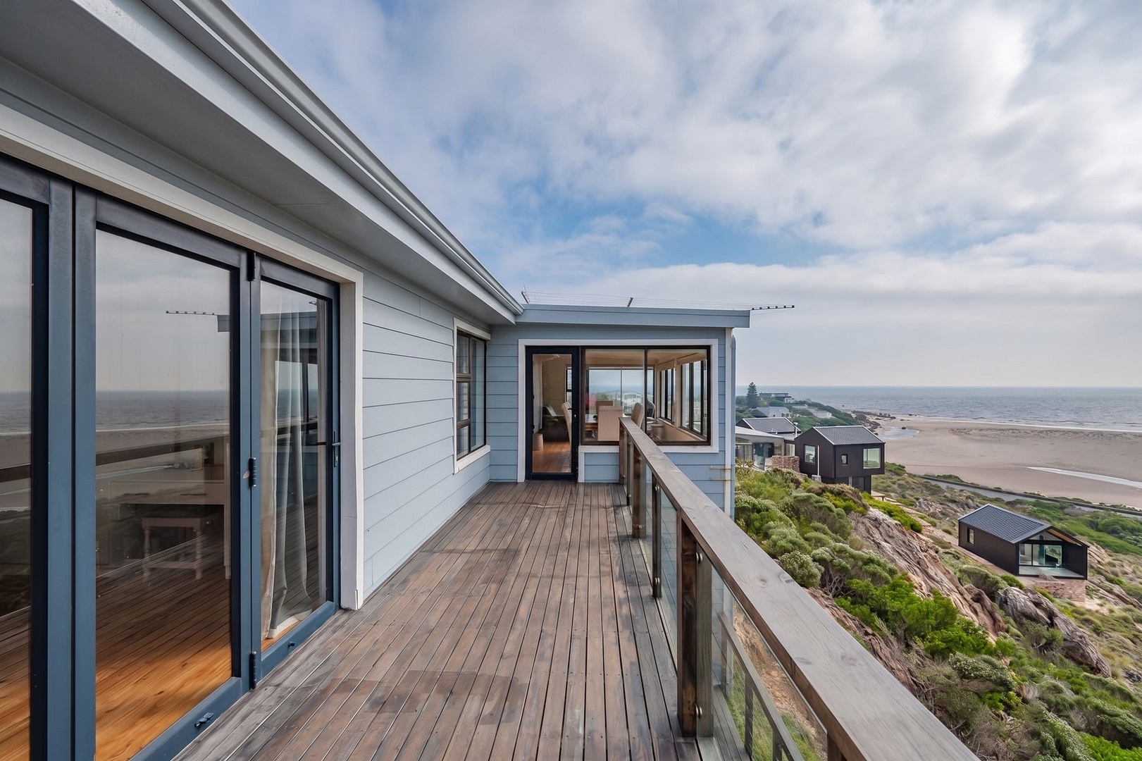 Modern Coastal Escape overlooking Beach, Valley and River below