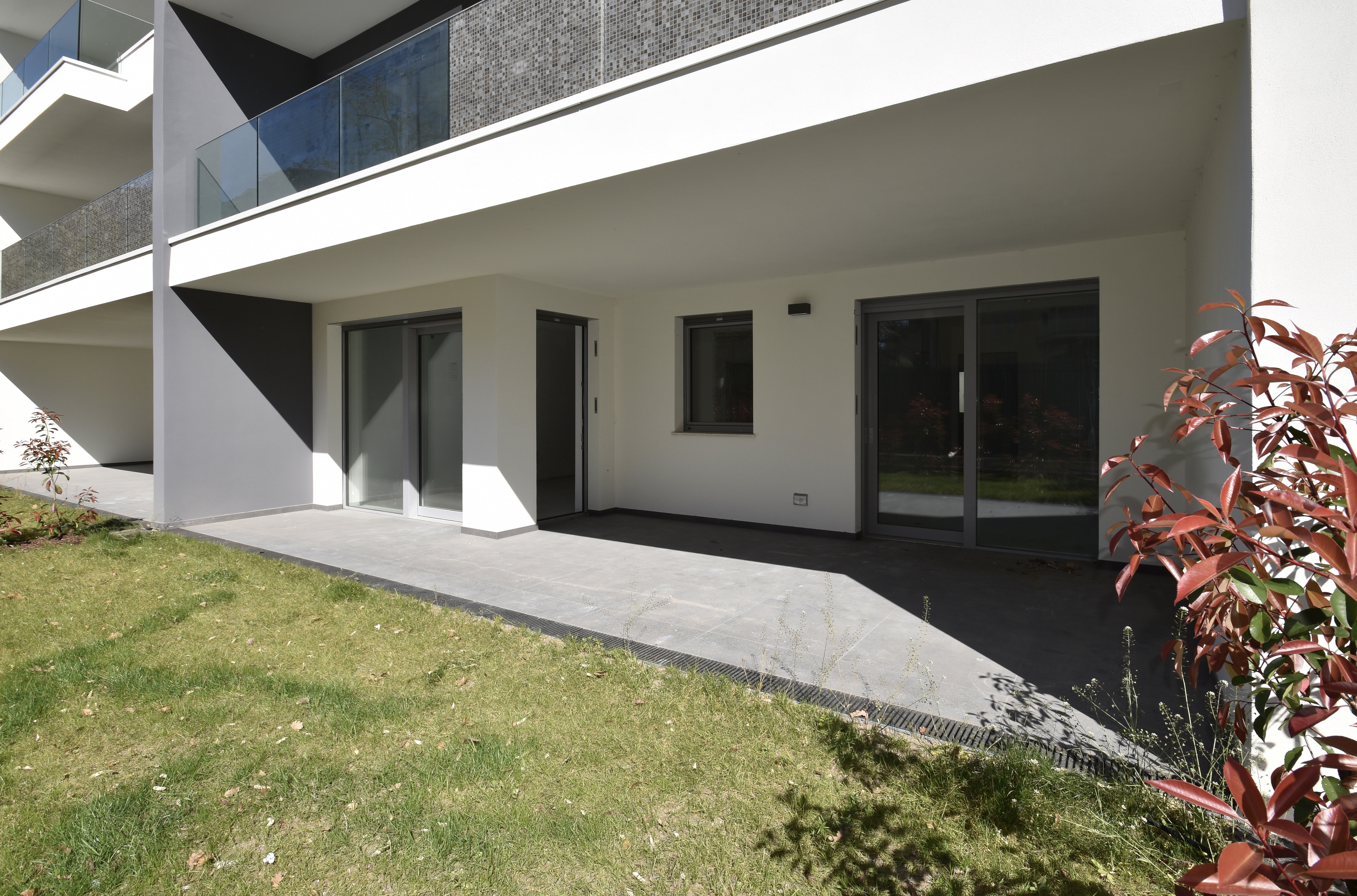 Scopri la nuova eleganza nel cuore di Trento:  un rifugio urbano di luce e prestigio con giardino.