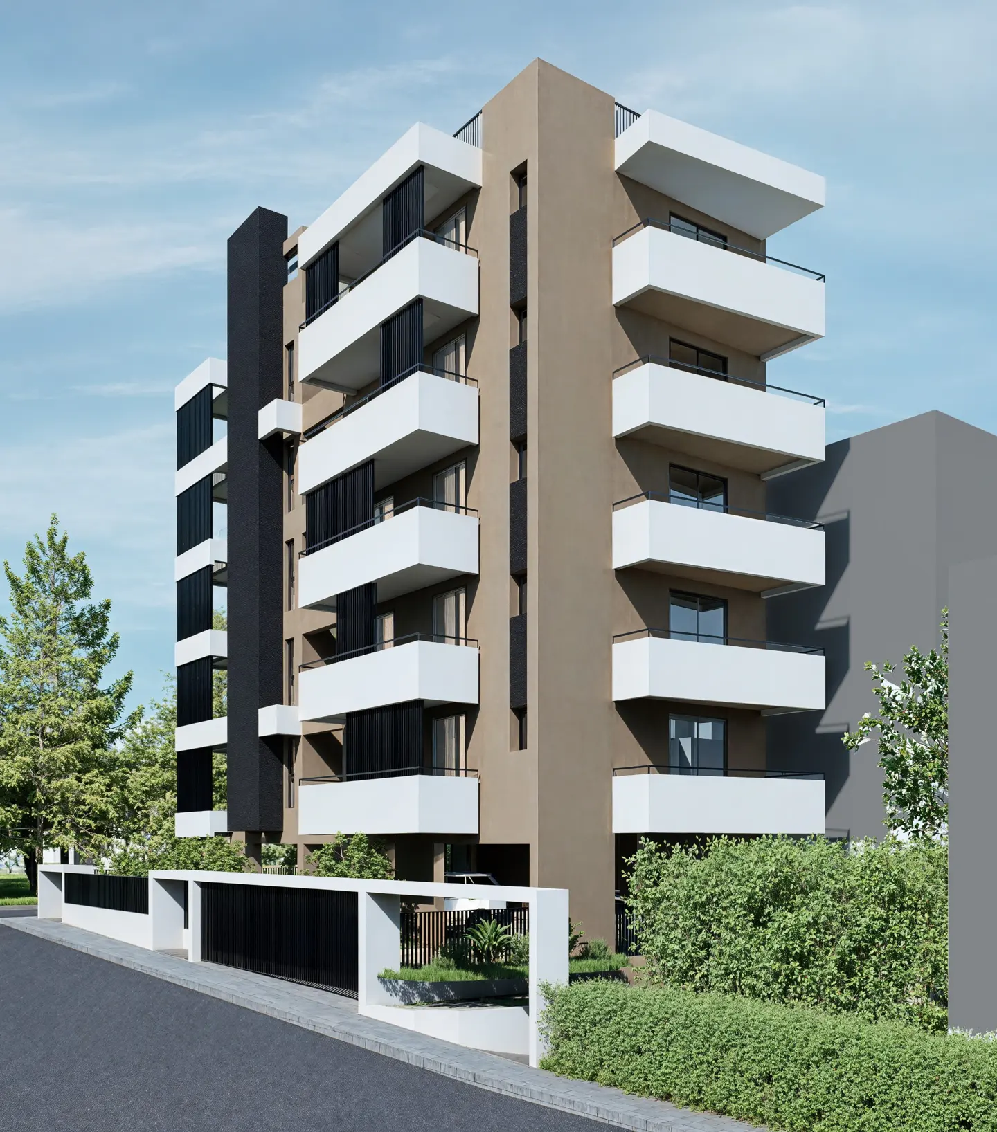Modern apartment building with white balconies and a black accent column against a blue sky.