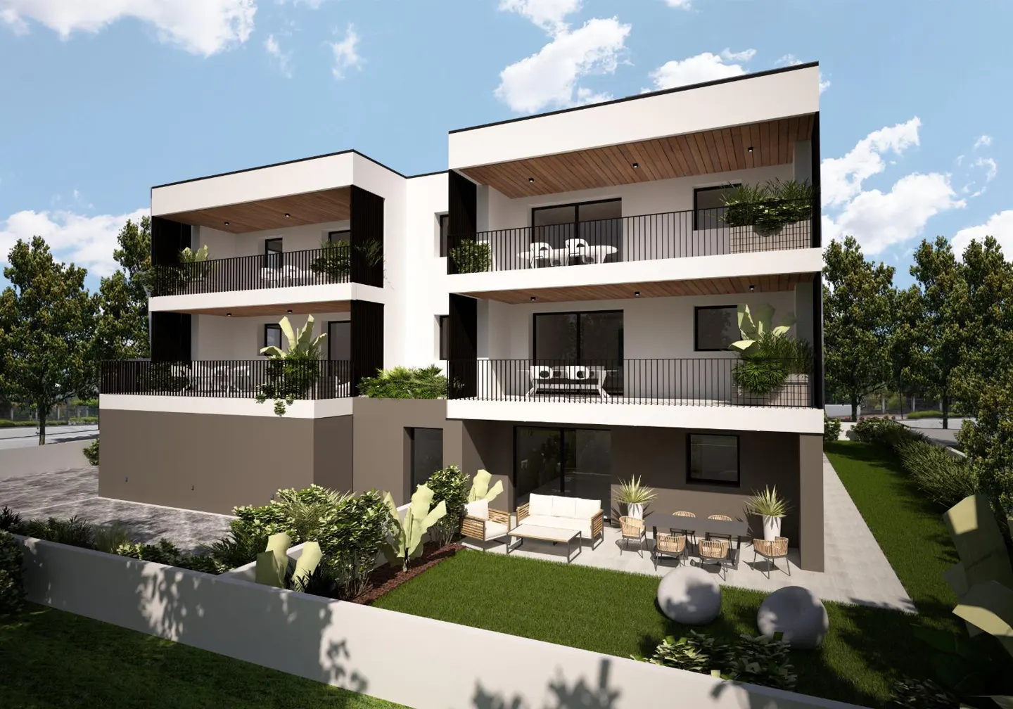 Modern three-story apartment building with white walls, black accents, and balconies. Outdoor seating area with green lawn.