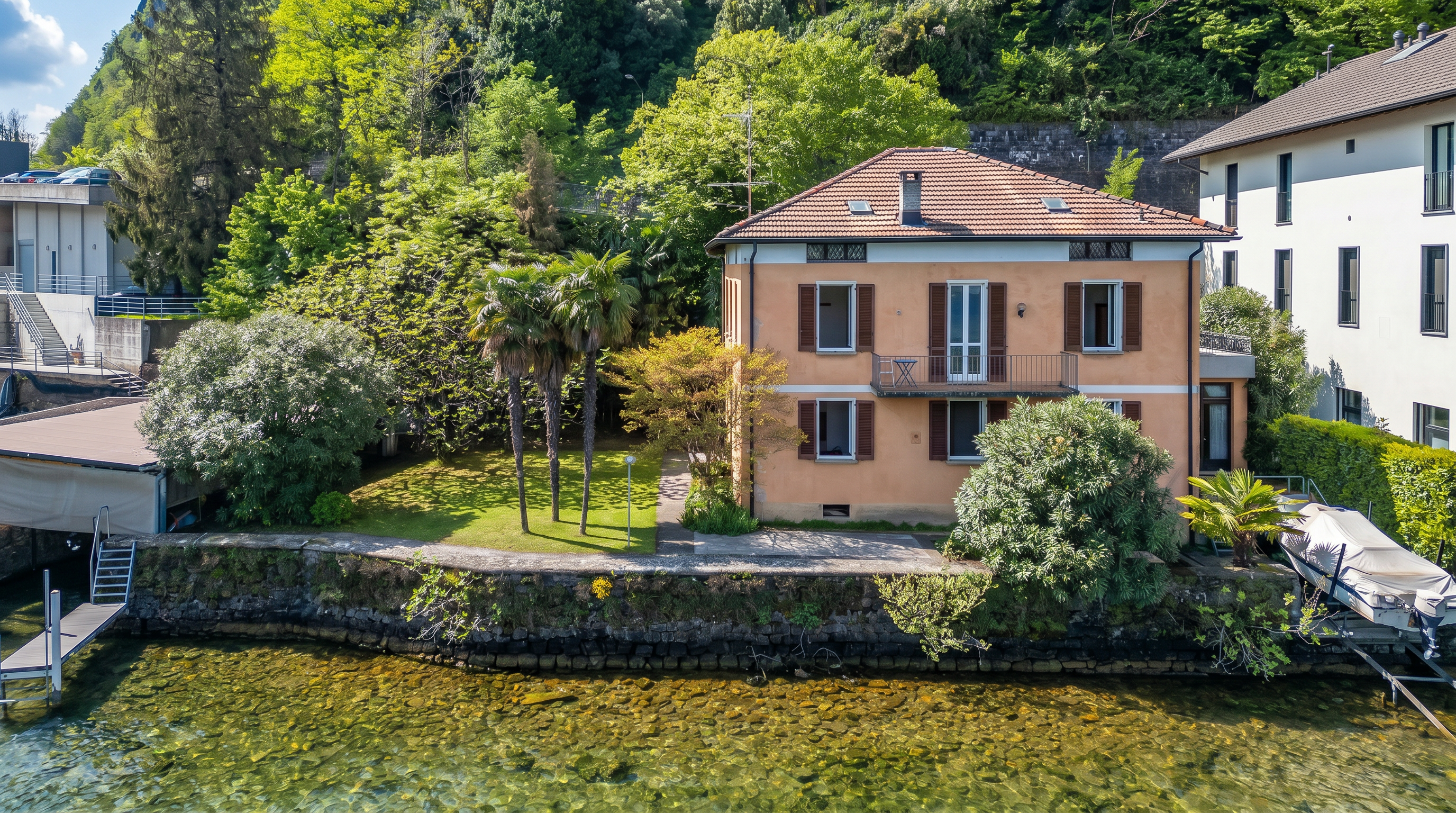Lakefront villa with private boathouse