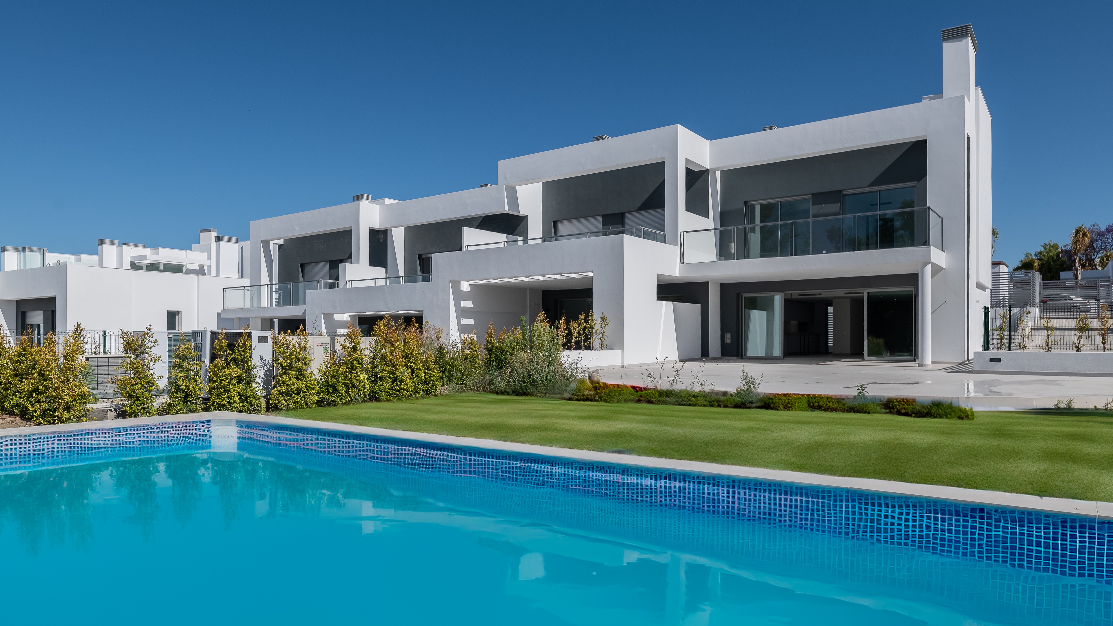 Amenity-Rich Townhouses with Pools and Gym