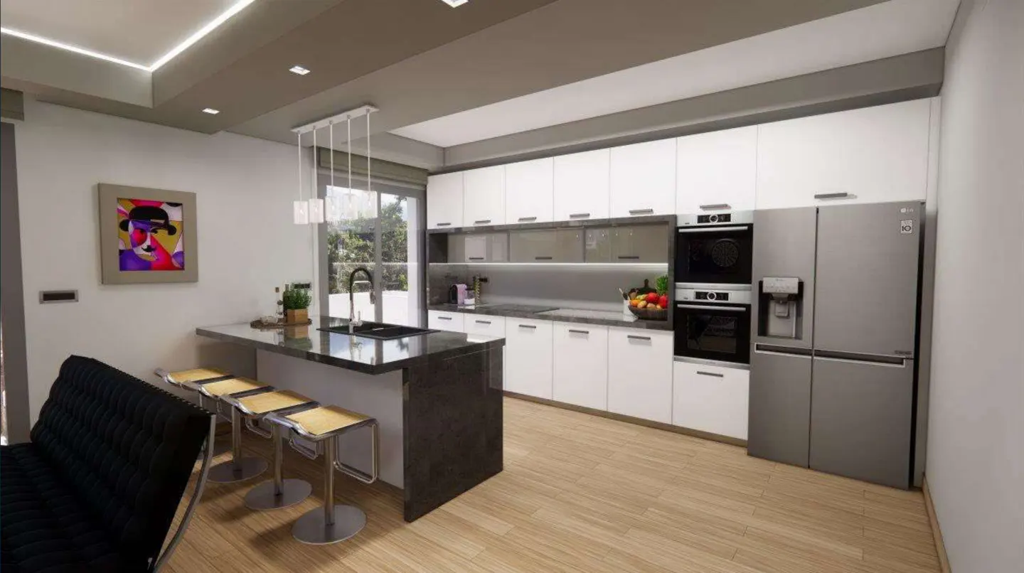 Modern kitchen with white cabinets, stainless steel appliances, and a black island with bar stools. A colorful painting hangs on the wall.