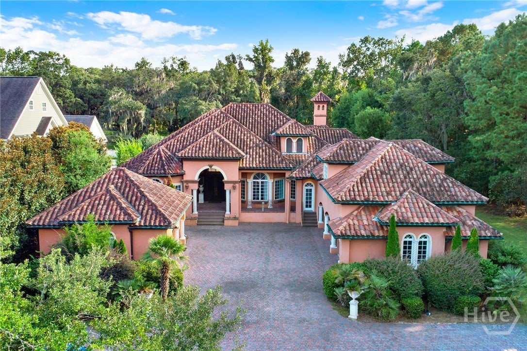 Gated Luxury Villa: Serene Setting, Community Waterfront