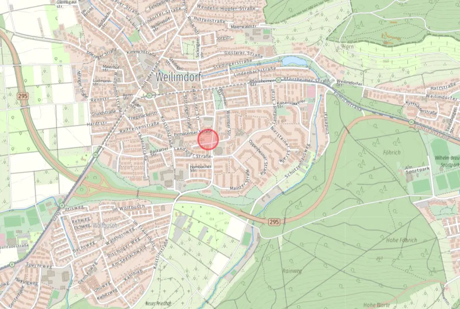 Map of Weilimdorf, Germany, with streets, green spaces, and a red circle highlighting a specific area.