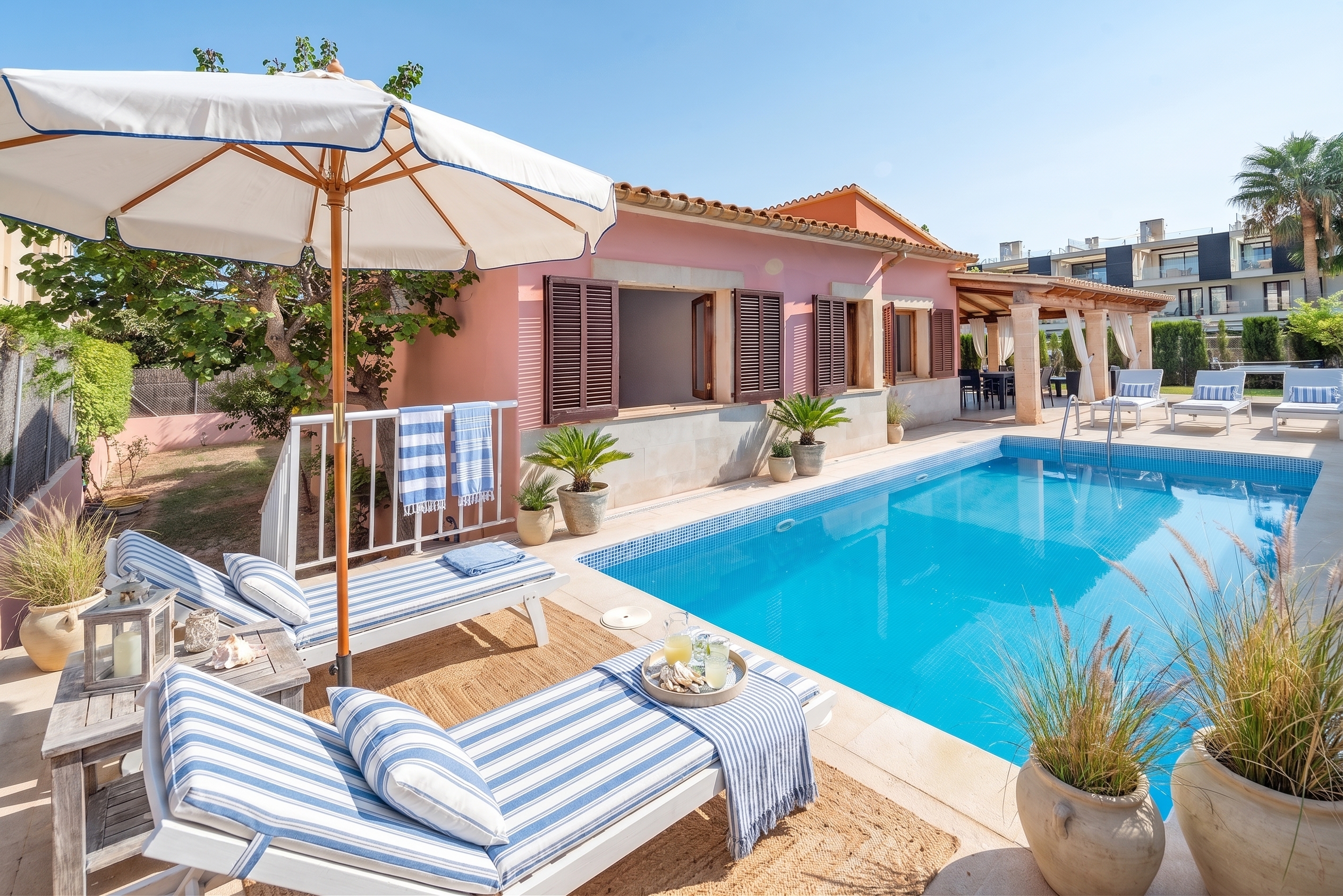 Semi-detached house with pool and ETV, just steps from the beach in Puerto Pollensa. [AI-modified]