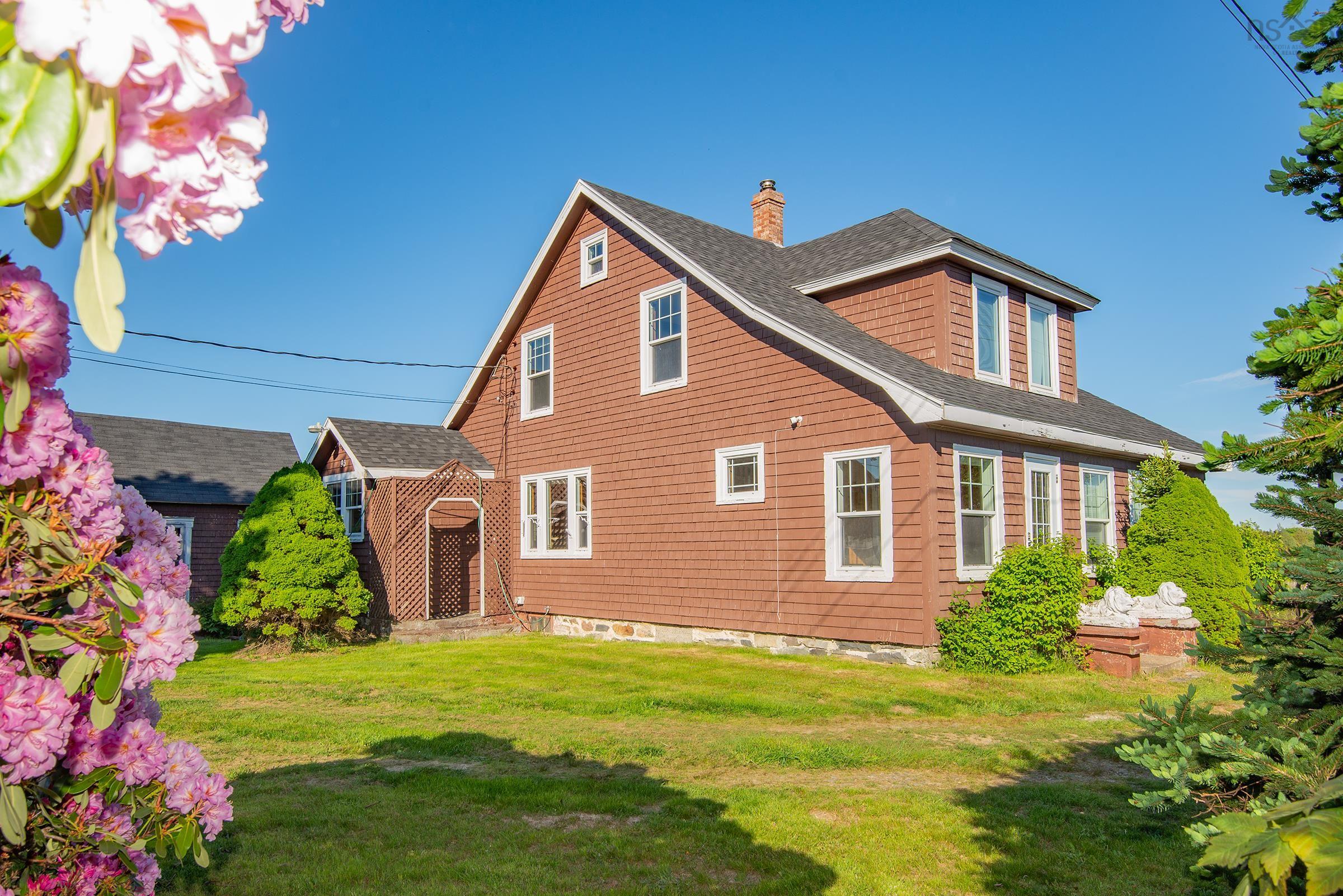 4-Bedroom Home on 9+ Acres with a Massive Barn/Workshop