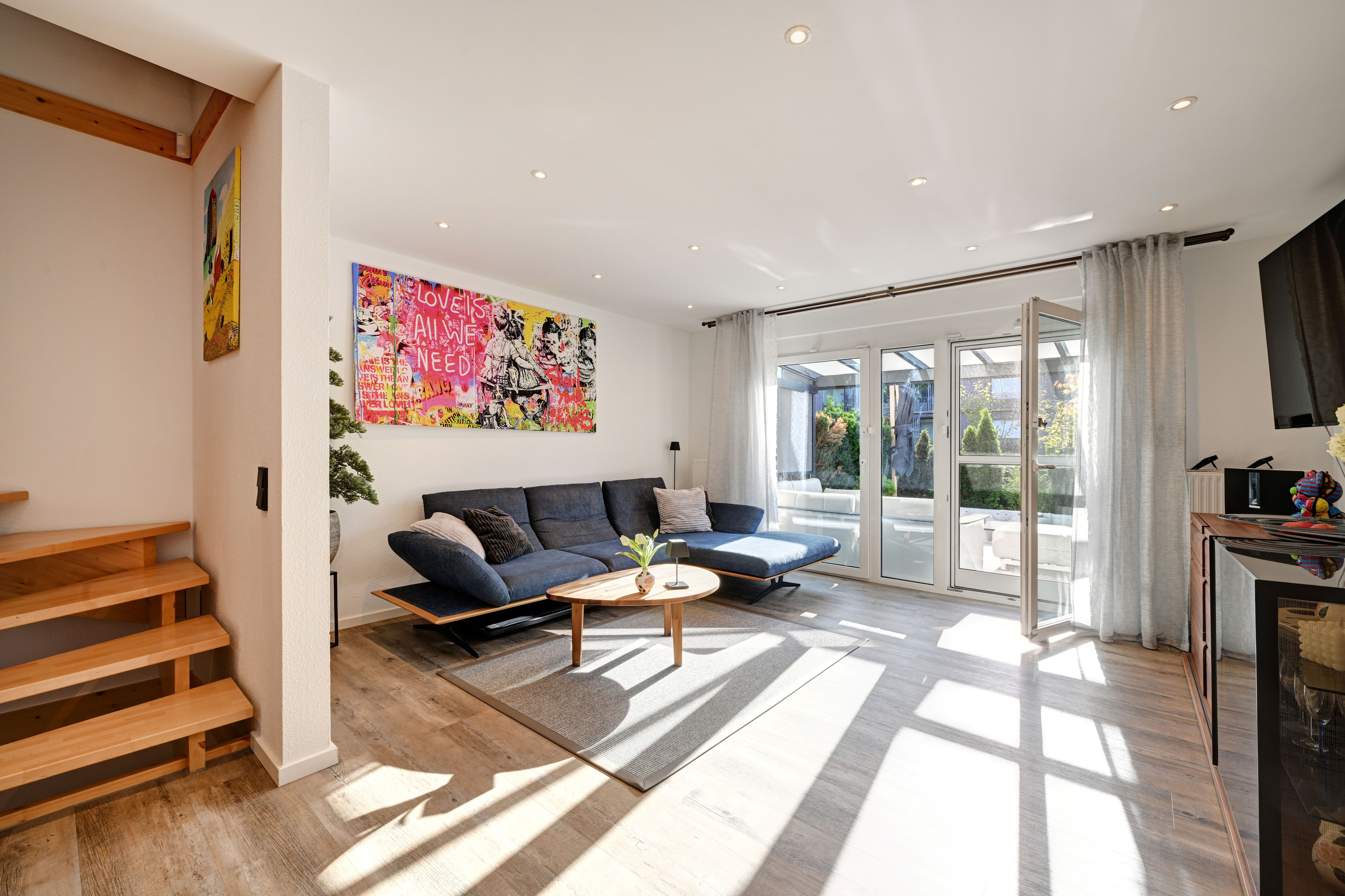 Modern mid-terrace house in a family-friendly residential development in Feldmoching