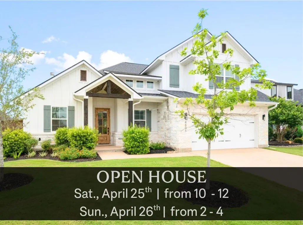 Open house image of a two-story white house with green shutters and a dark roof. The front door is wood with glass panels.