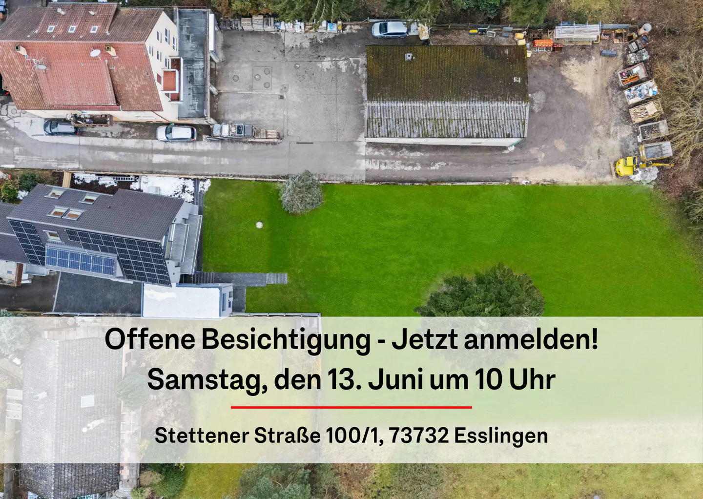 Aerial view of a property with a green lawn, buildings, and an open house announcement.