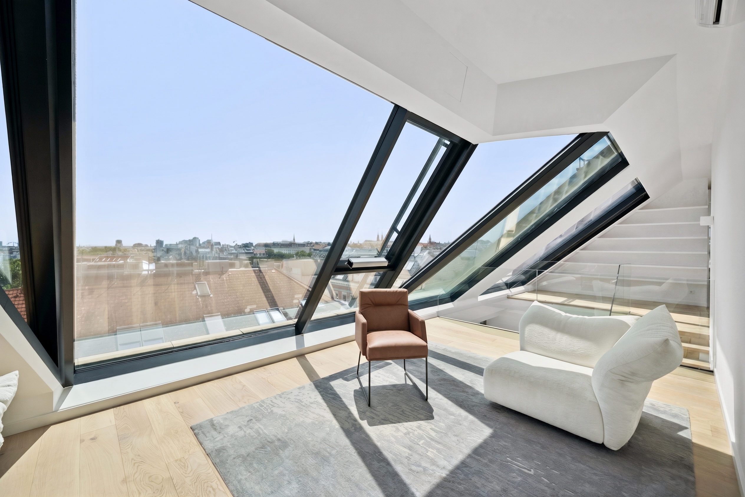 An architectural statement in Vienna’s 9th district – penthouse apartment with breathtaking views [AI-modified]