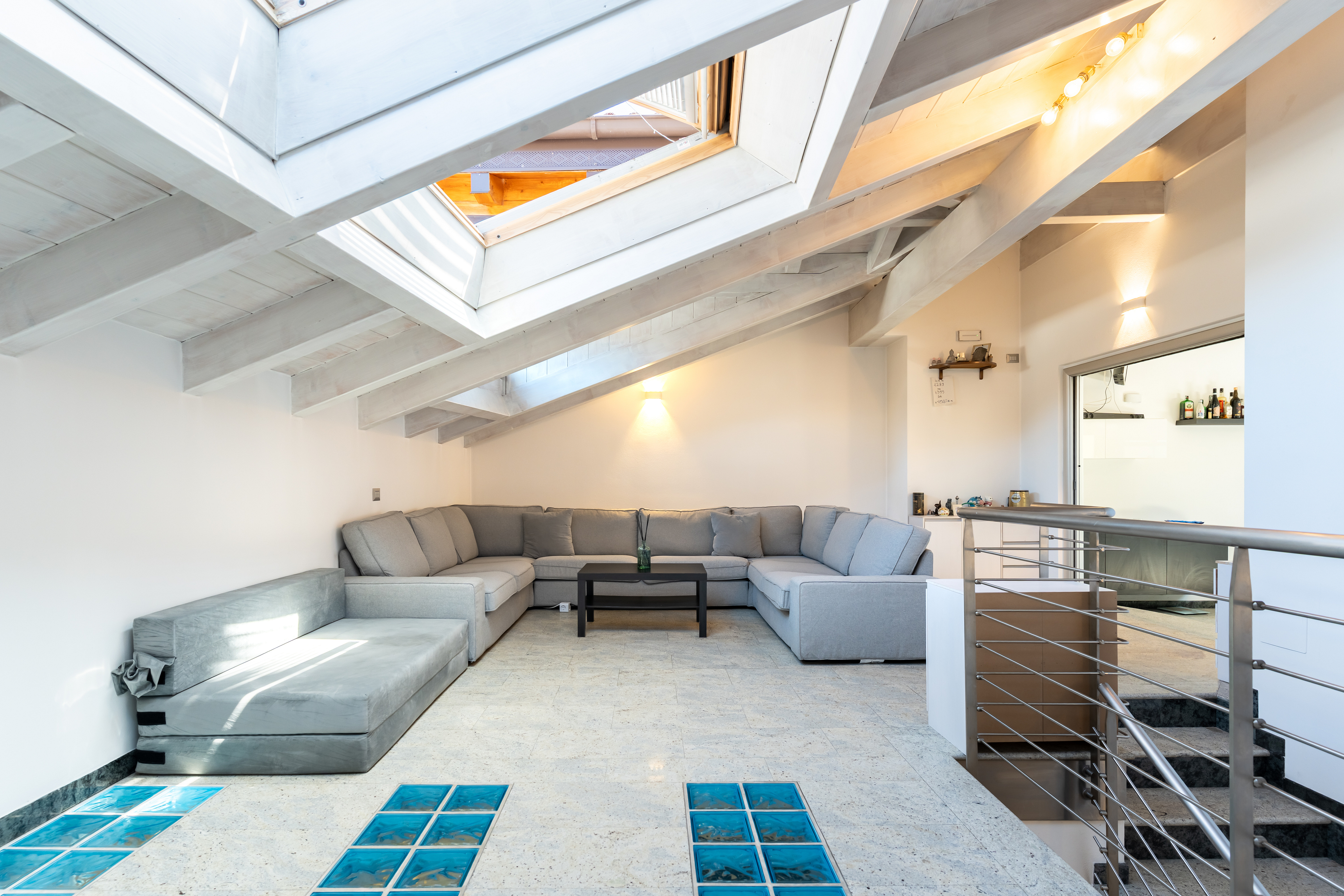 Bright duplex attic apartment with garage, parking space, and all the room you need!