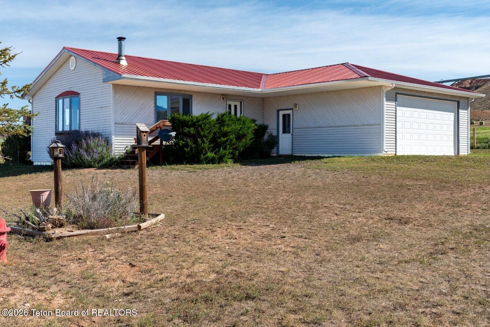 Mountain Views Meet Potential & Prime Location in Dubois