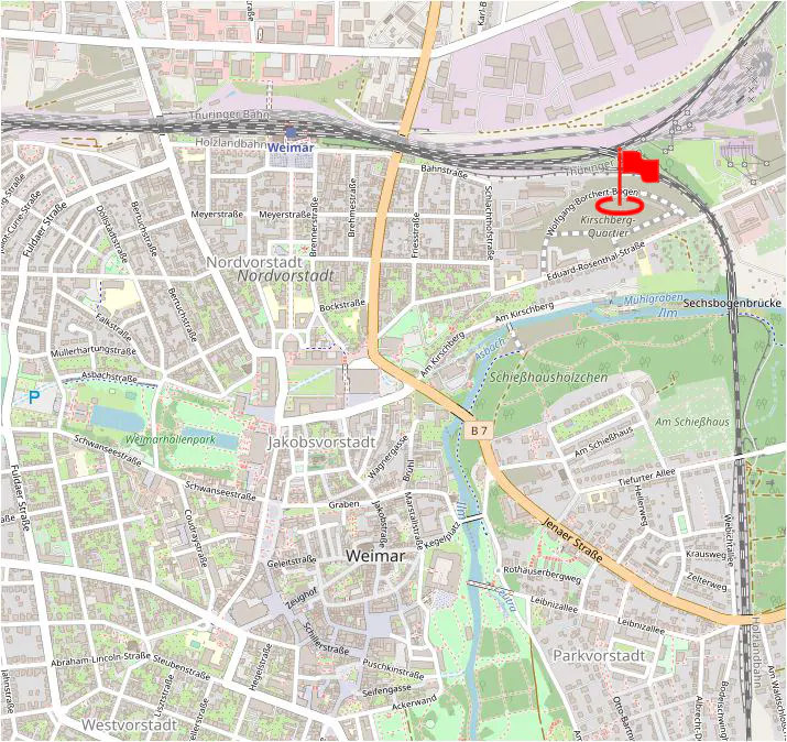 Map of Weimar, Germany, showing streets, parks, and a red flag marking the Kirschberg Quartier neighborhood near the Thüringer Bahn railway.