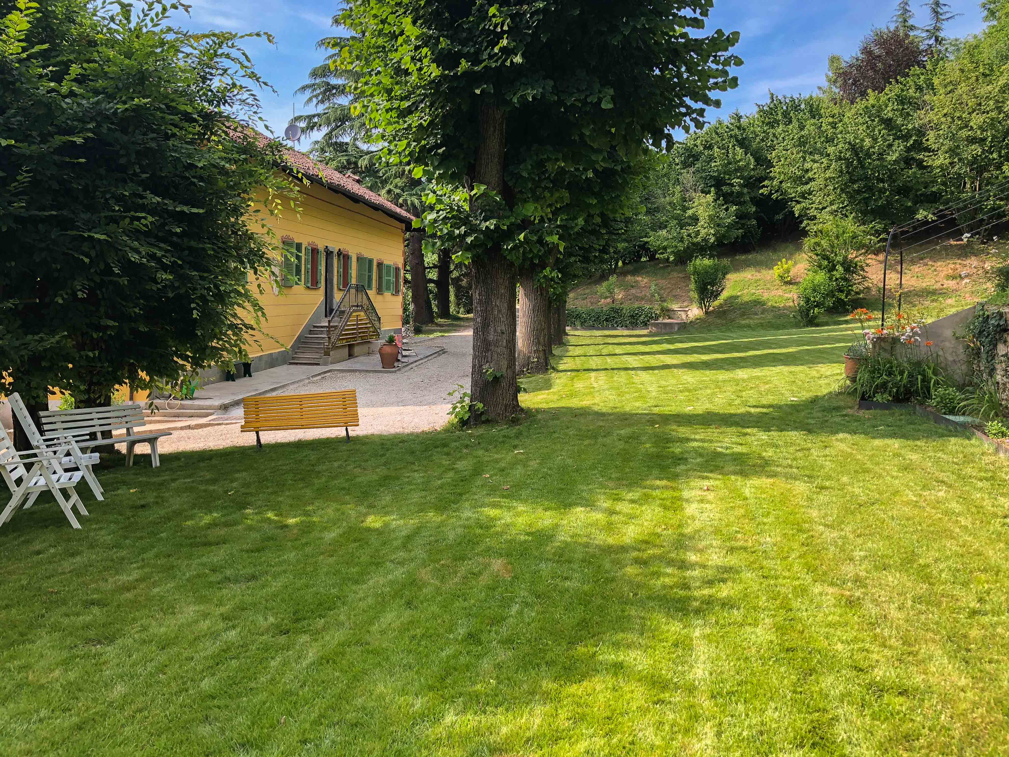 Historic residence surrounded by the greenery of the Langhe