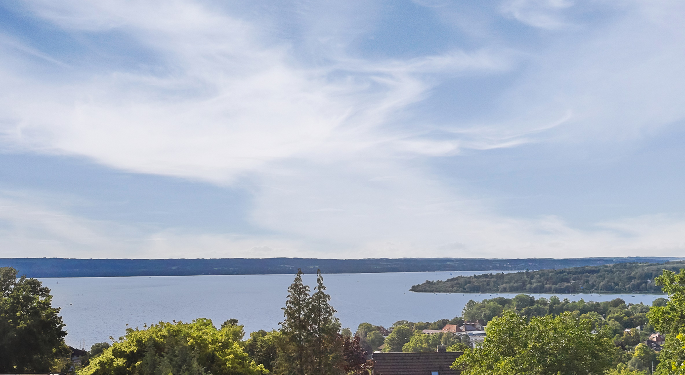 Grundstück in Herrsching mit Baugenehmigung und Panoramasicht auf den Ammersee