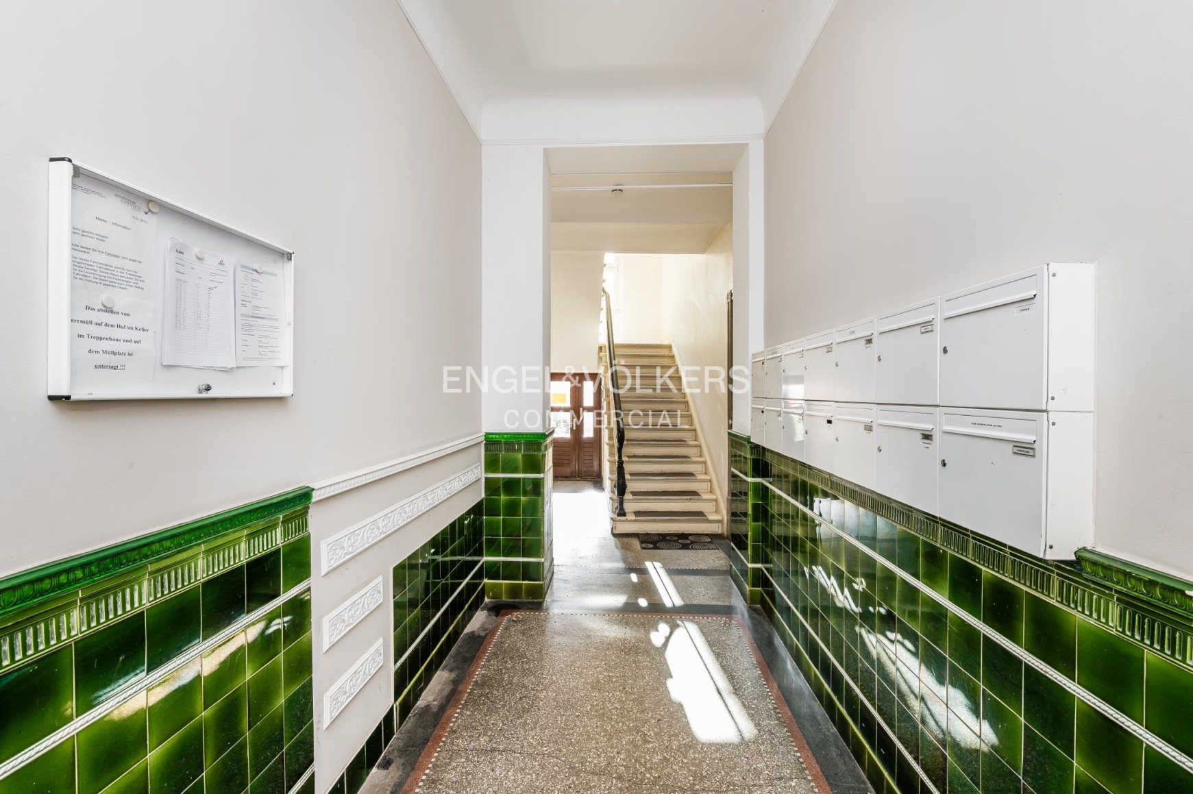 Well-maintained residential and commercial building with undeveloped attic