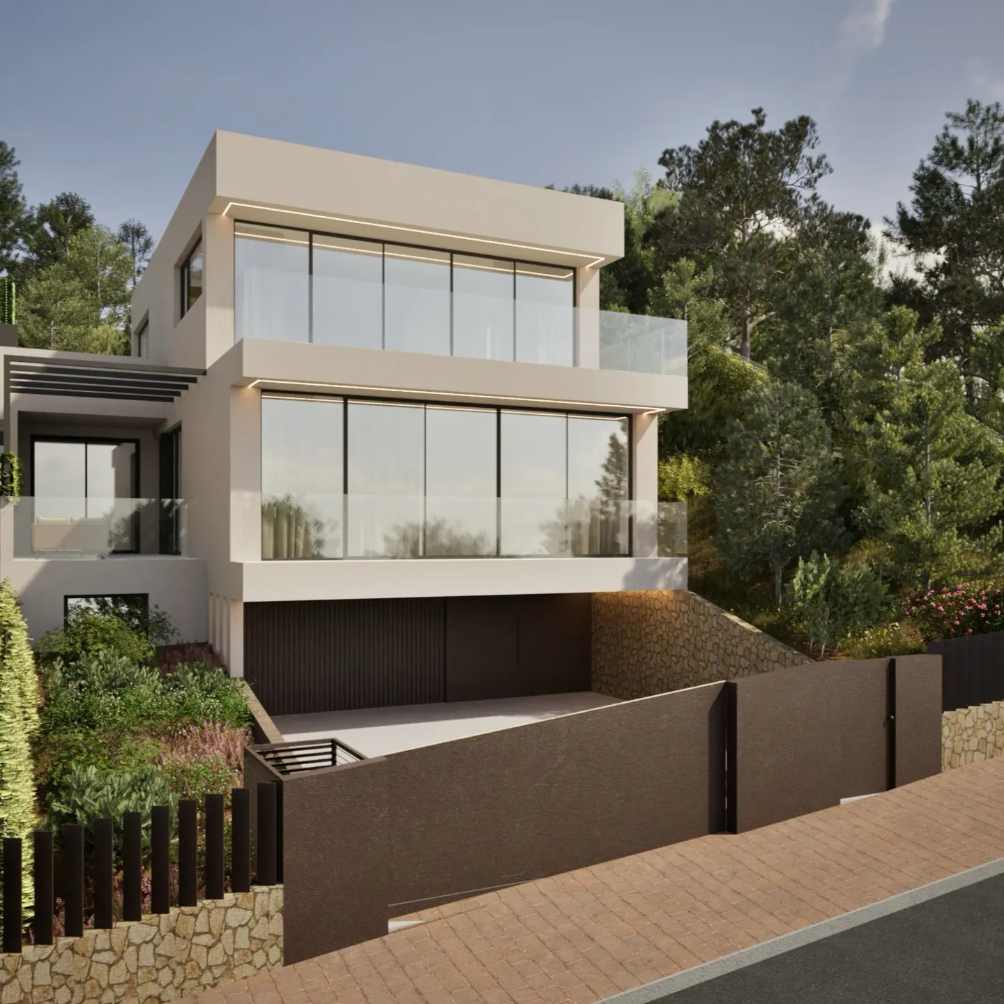 Modern, three-story house with large windows and balconies, set on a hillside with lush greenery. Brown fence and stone wall in the foreground.