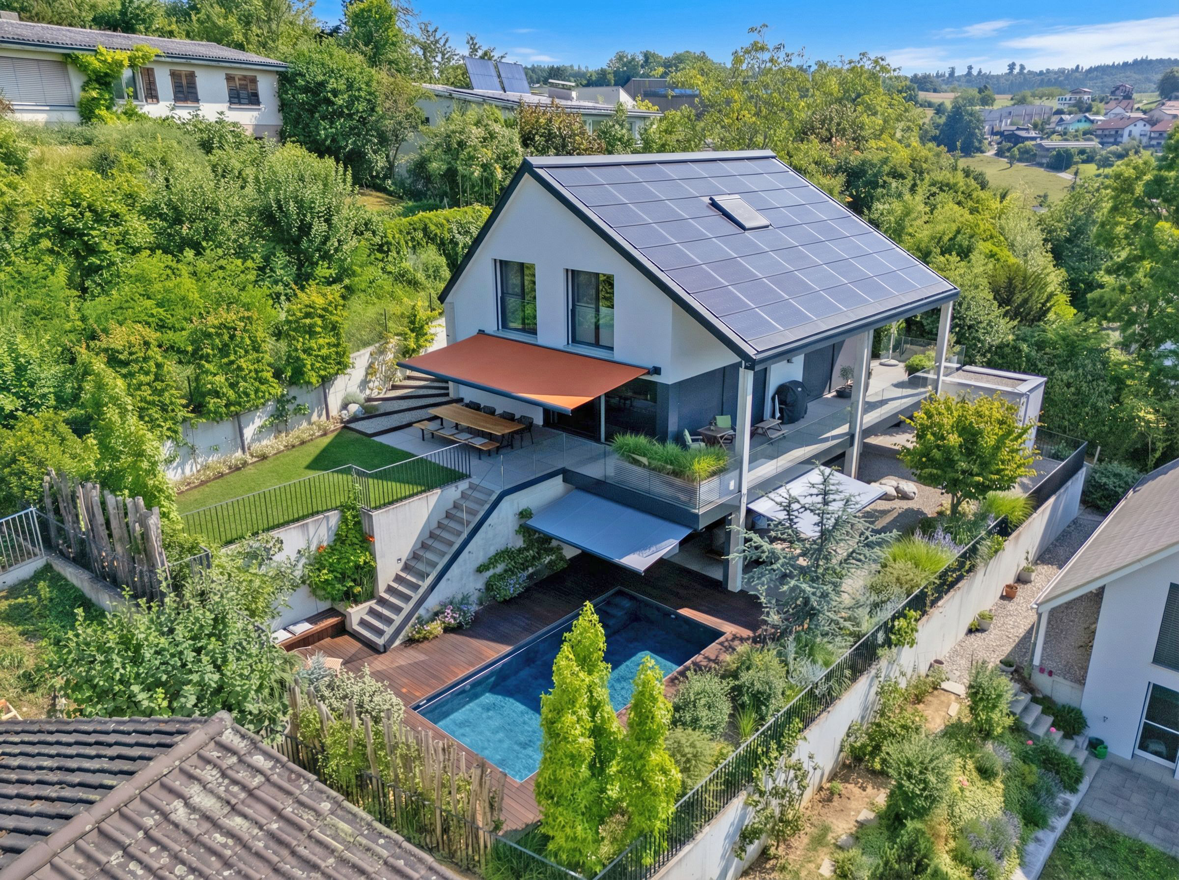 A modern two-story house with solar panels, a pool, and a landscaped yard on a sunny day.