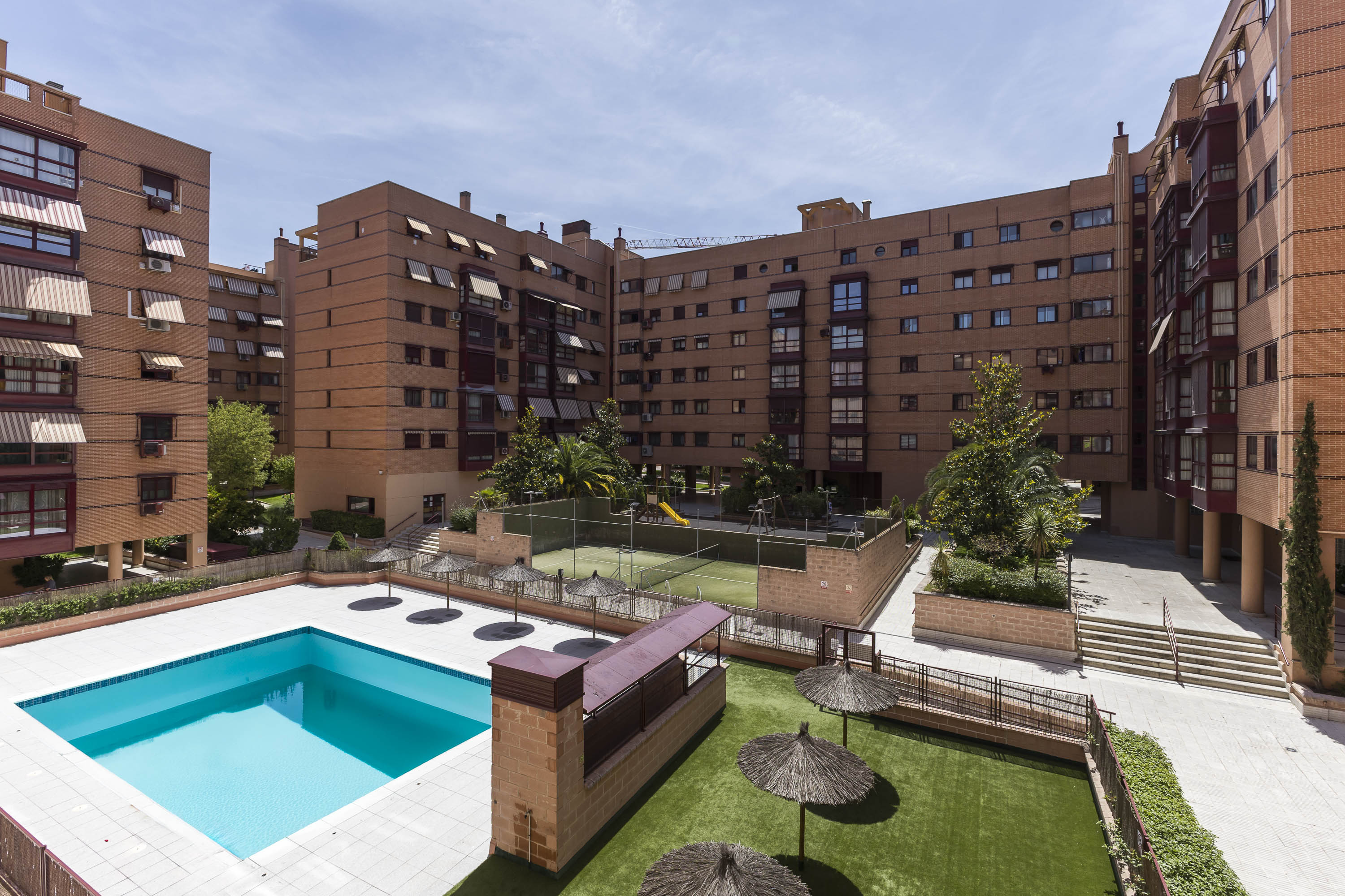 Exclusive residential property with pool, paddle tennis court, and 24h security in Suanzes