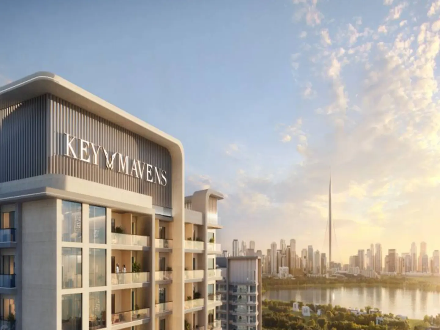 Exterior view of Key Maven's building with balconies, and Dubai skyline in the background.