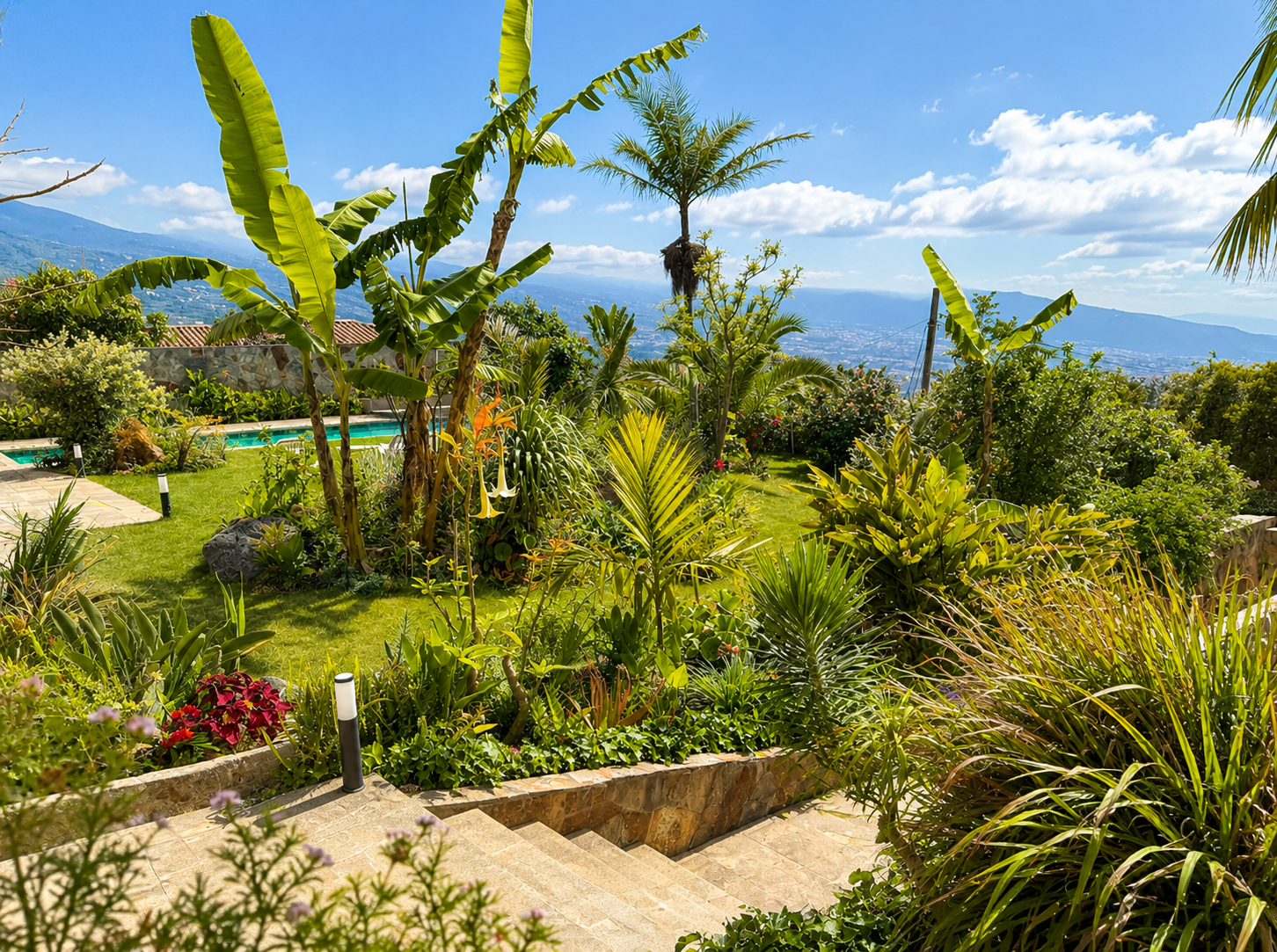 Modern villa with pool, tropical garden and spectacular ocean views