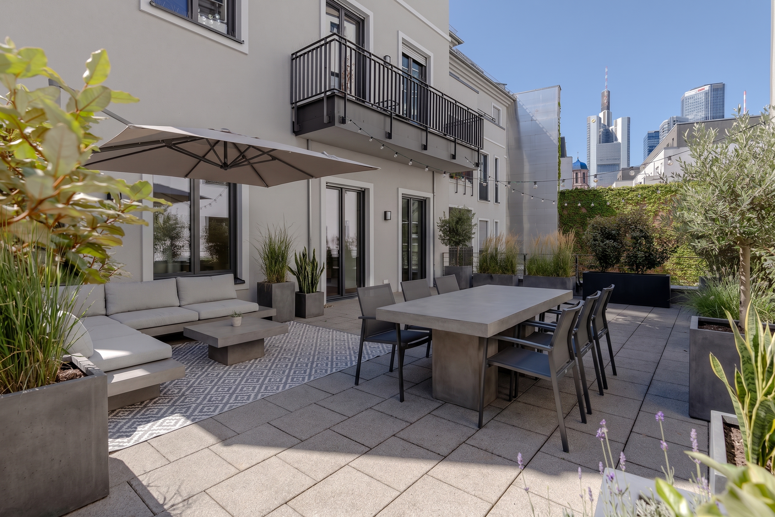 Modern Elegance in a Secluded Courtyard Ensemble: A City Sanctuary with an Expansive Terrace & Skyline Views [AI-modified]