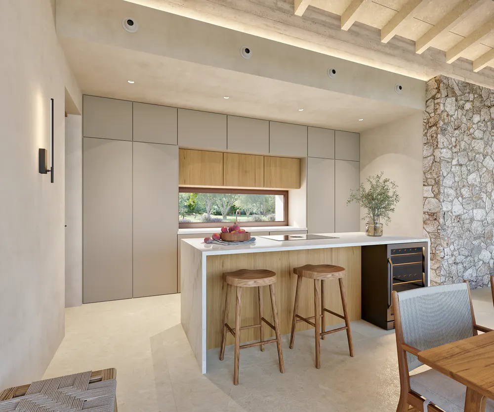 Modern kitchen with light wood cabinets, a white countertop island with stools, and a stone accent wall.