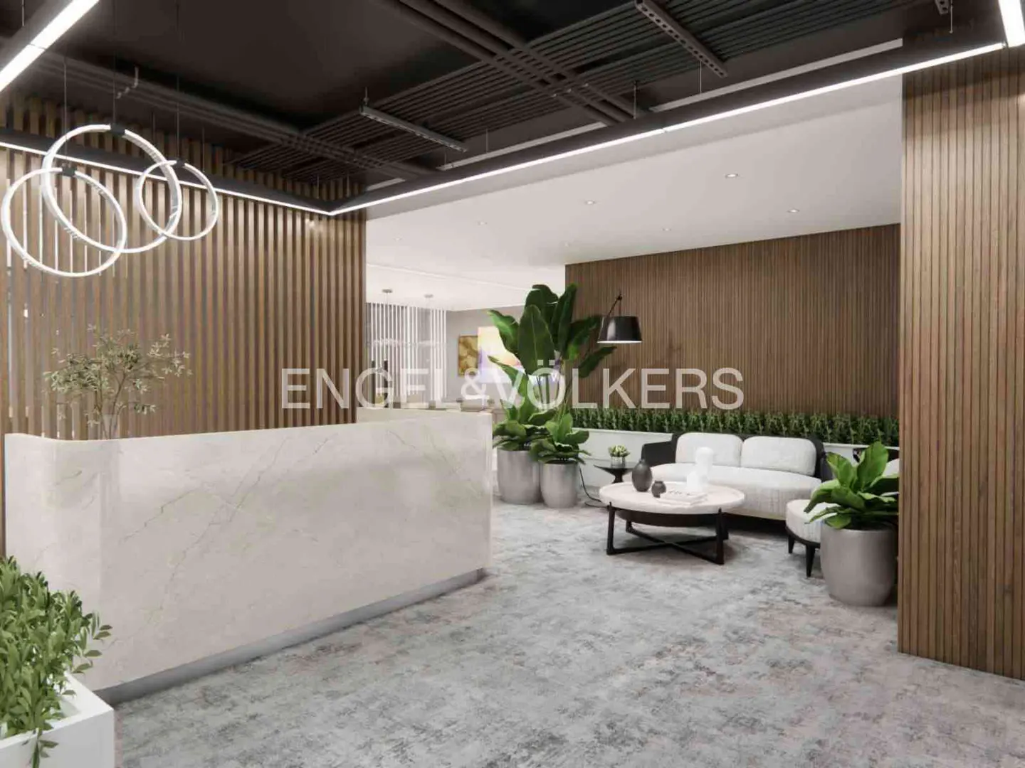 Modern office lobby with a marble reception desk, wood-paneled walls, and a white sofa seating area. Potted plants add a touch of greenery.