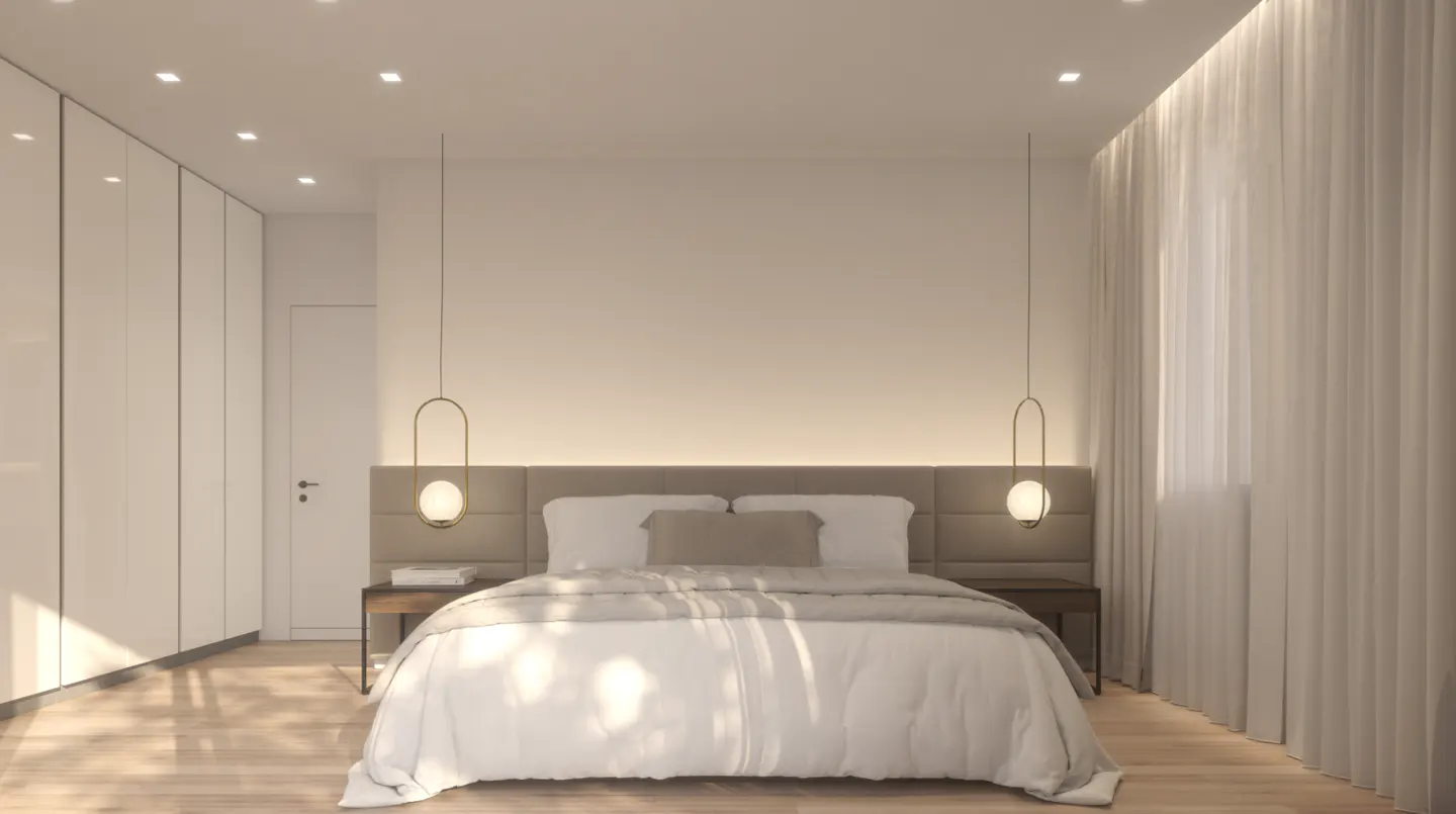 Bright bedroom with a bed, white linens, and a gray headboard. Two pendant lights hang above nightstands. White curtains and a closet are visible.