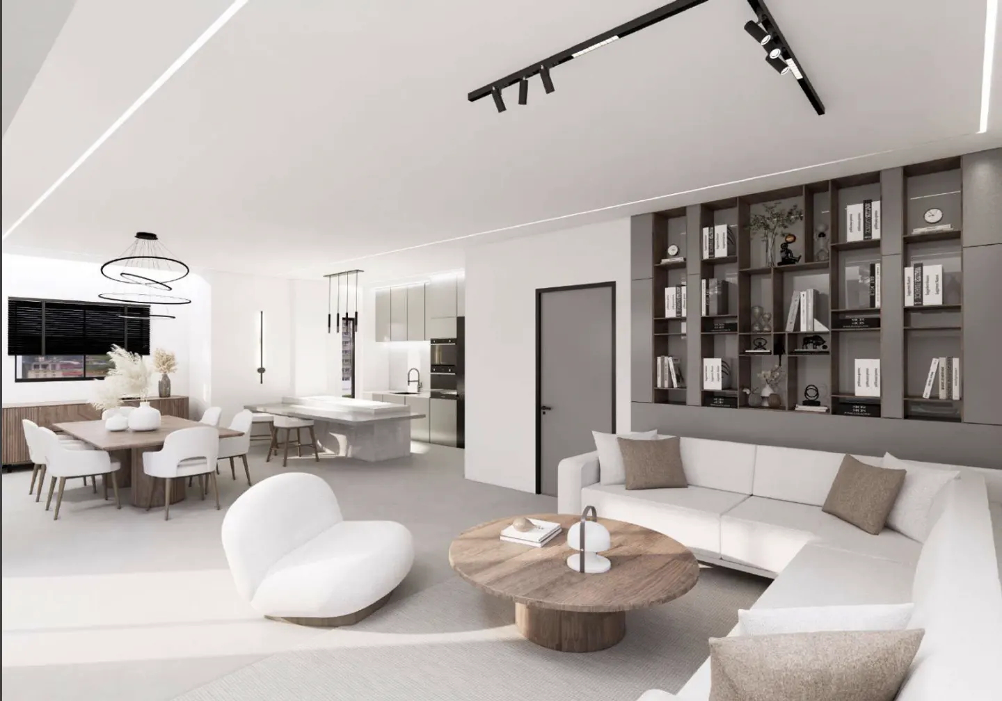 A bright, modern open-concept living space with white furniture, a wood coffee table, and a gray bookshelf. A dining area and kitchen are visible in the background.