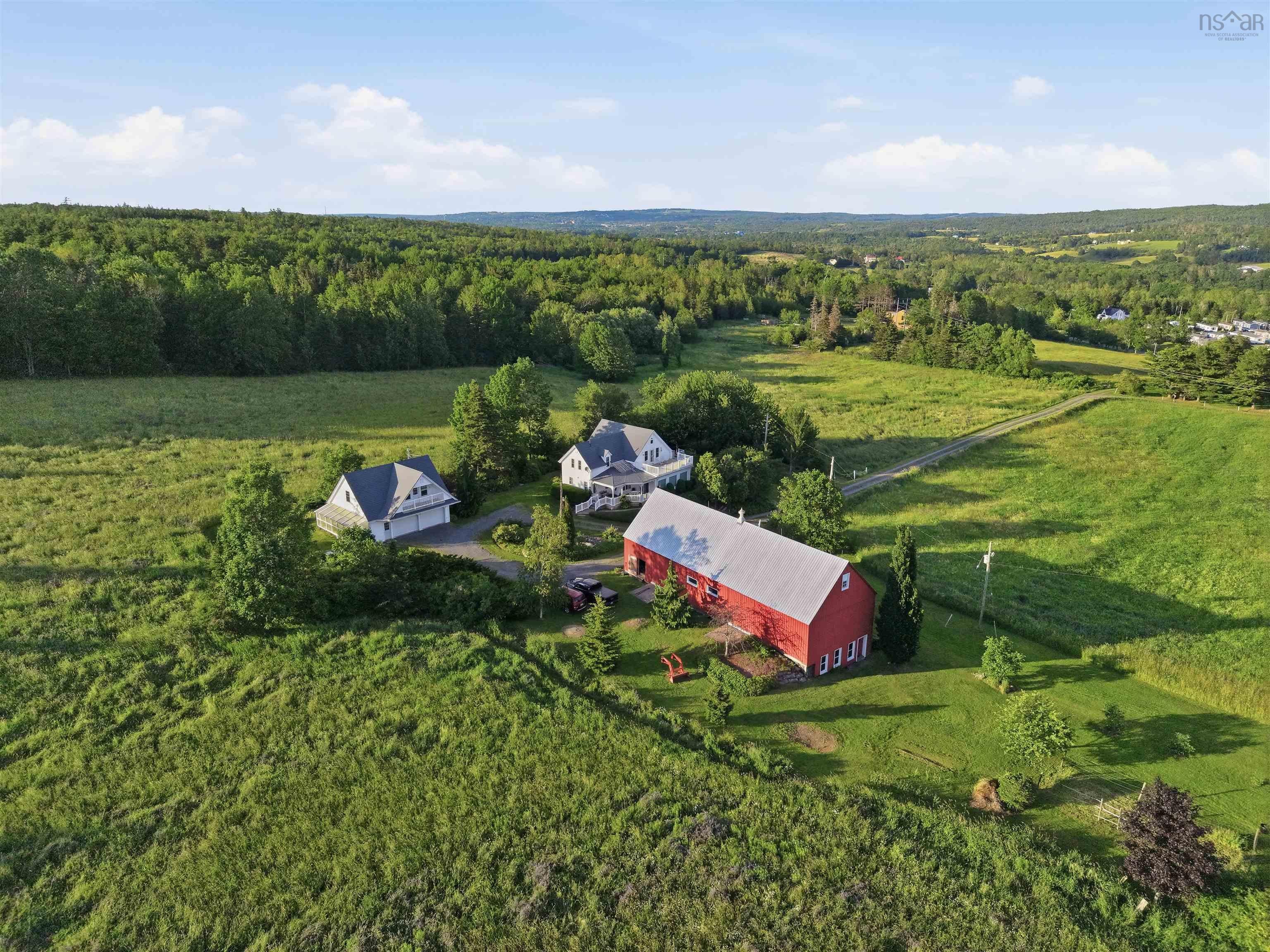 162-Acre Nova Scotia Estate: Barn, Guest Suite & Orchard!