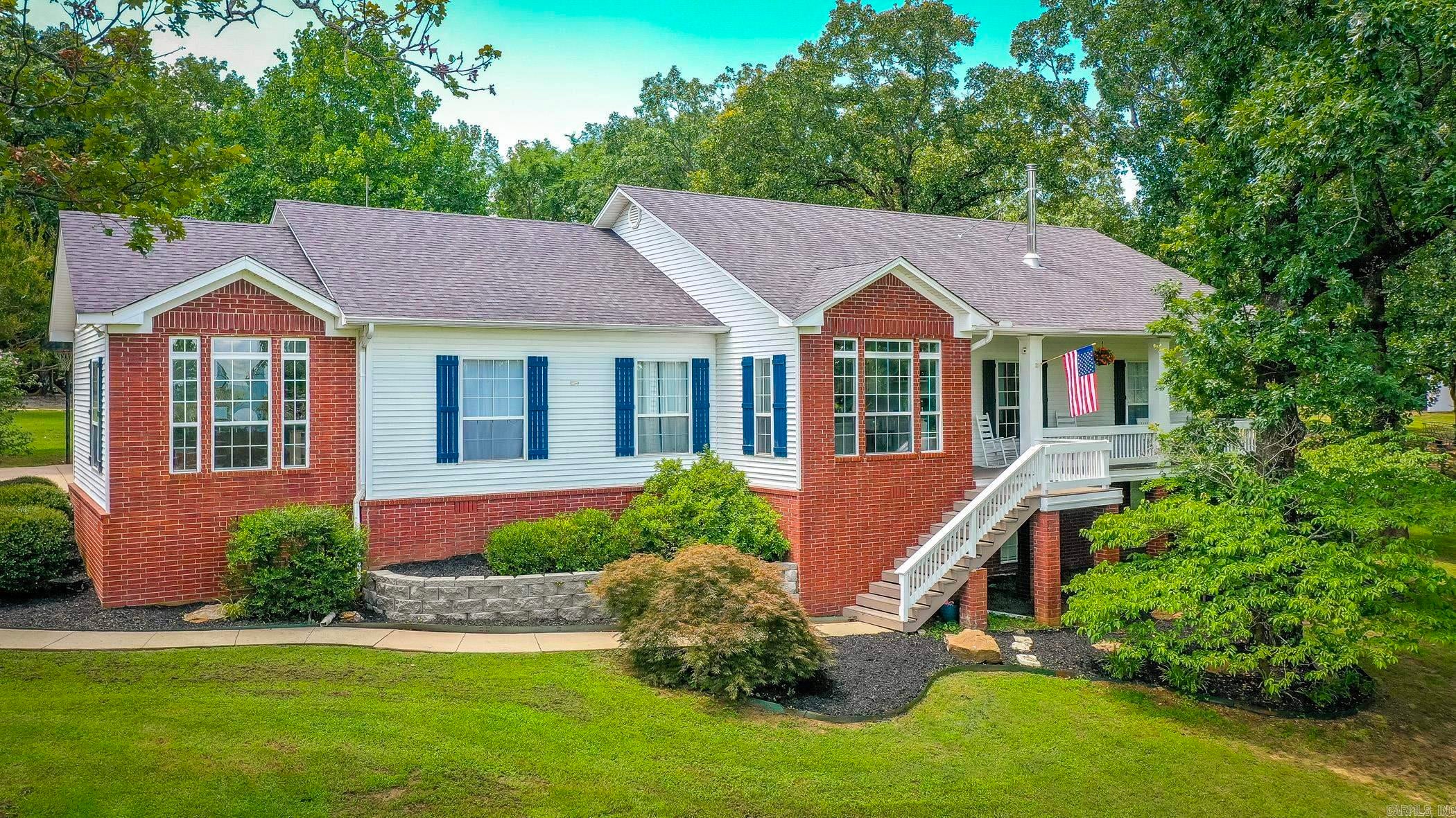 Spacious Home Elevated atop 7.2 Acres of Rolling Countryside