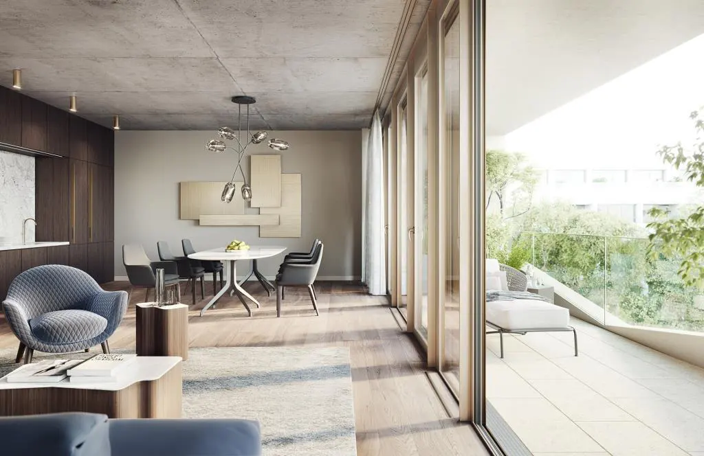 A modern living and dining area with a blue armchair, dining table, and balcony with outdoor furniture.