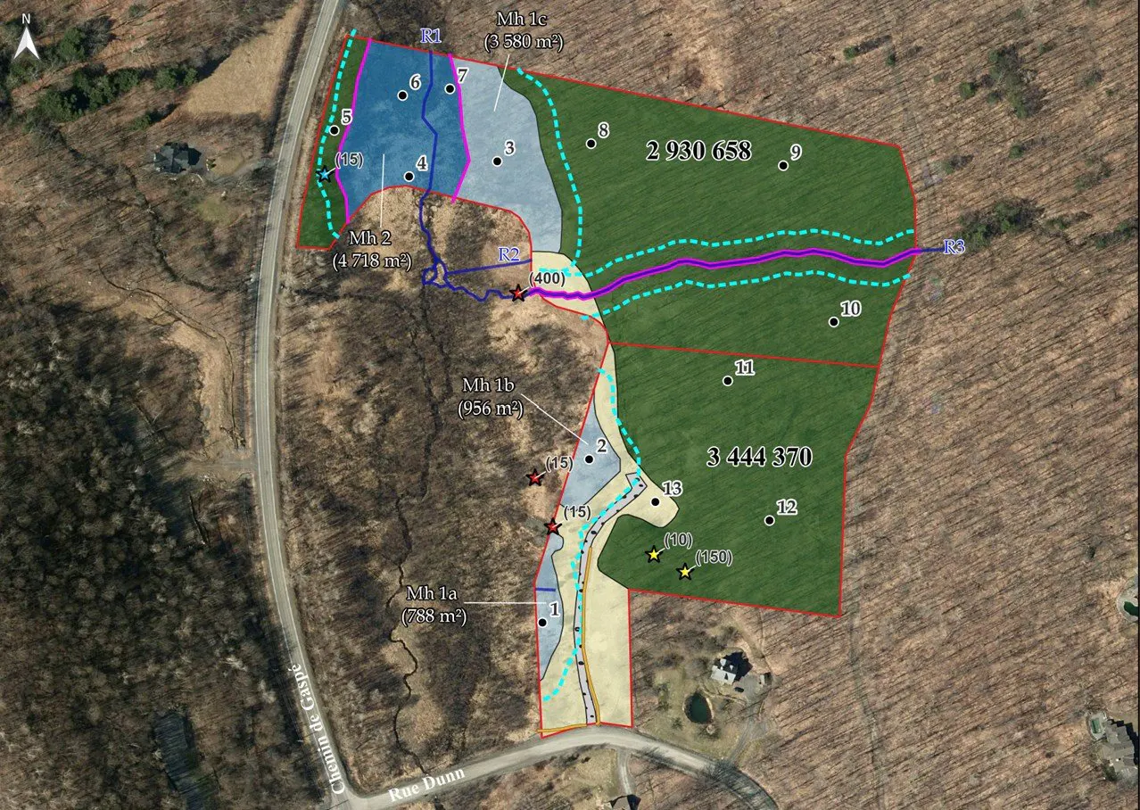 Aerial view of a land plot map with color-coded zones, numbered markers, and property boundaries overlaid on a wooded area.