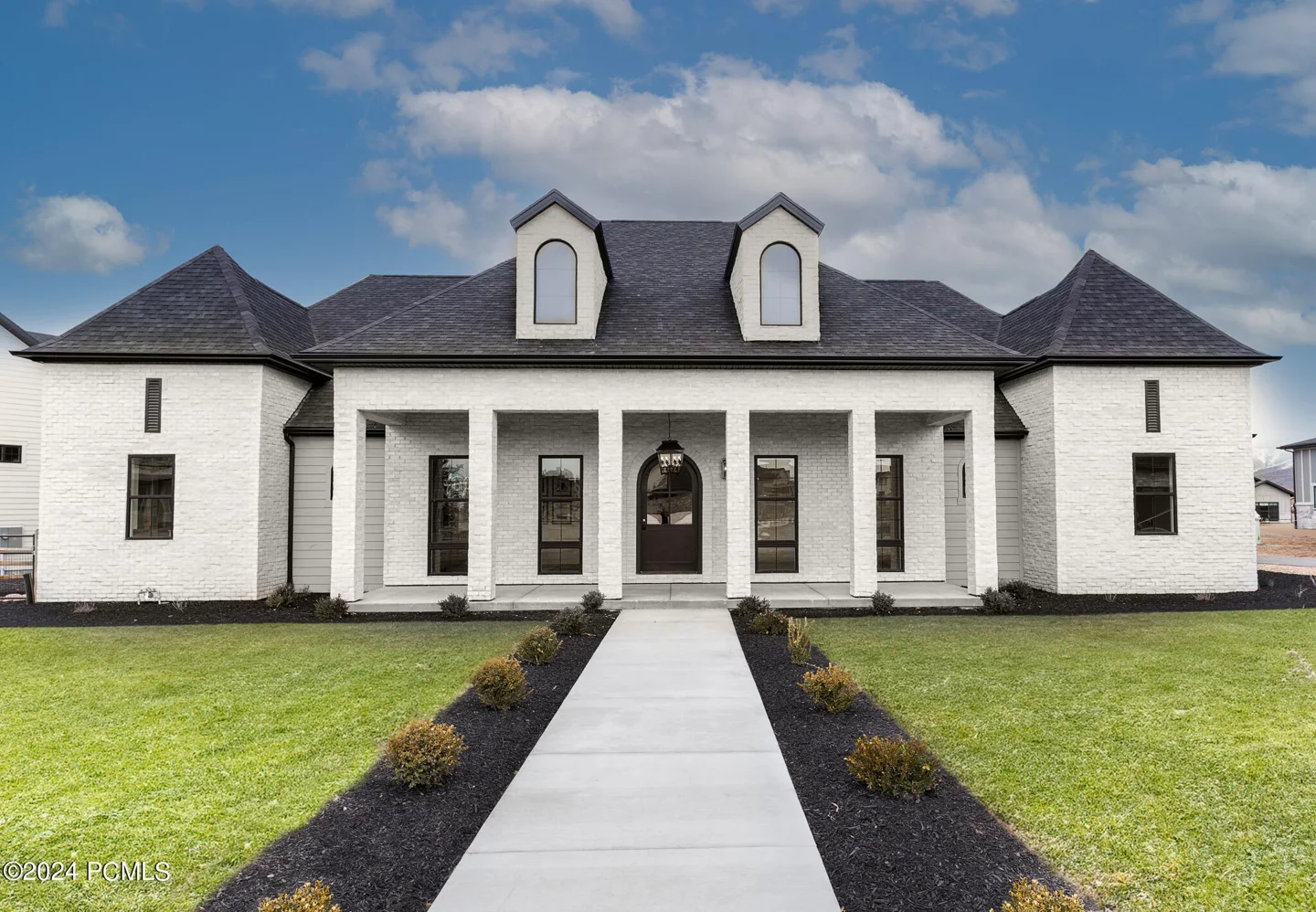 This timeless home offers luxurious main level living