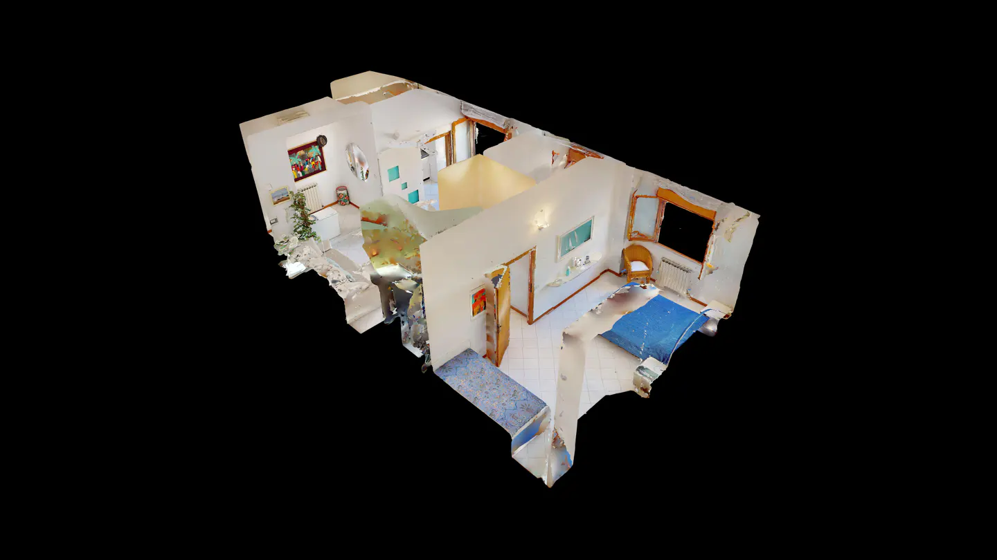 3D floor plan of a home with a living room, kitchen, and bedroom. The bedroom has a blue bed and a window.