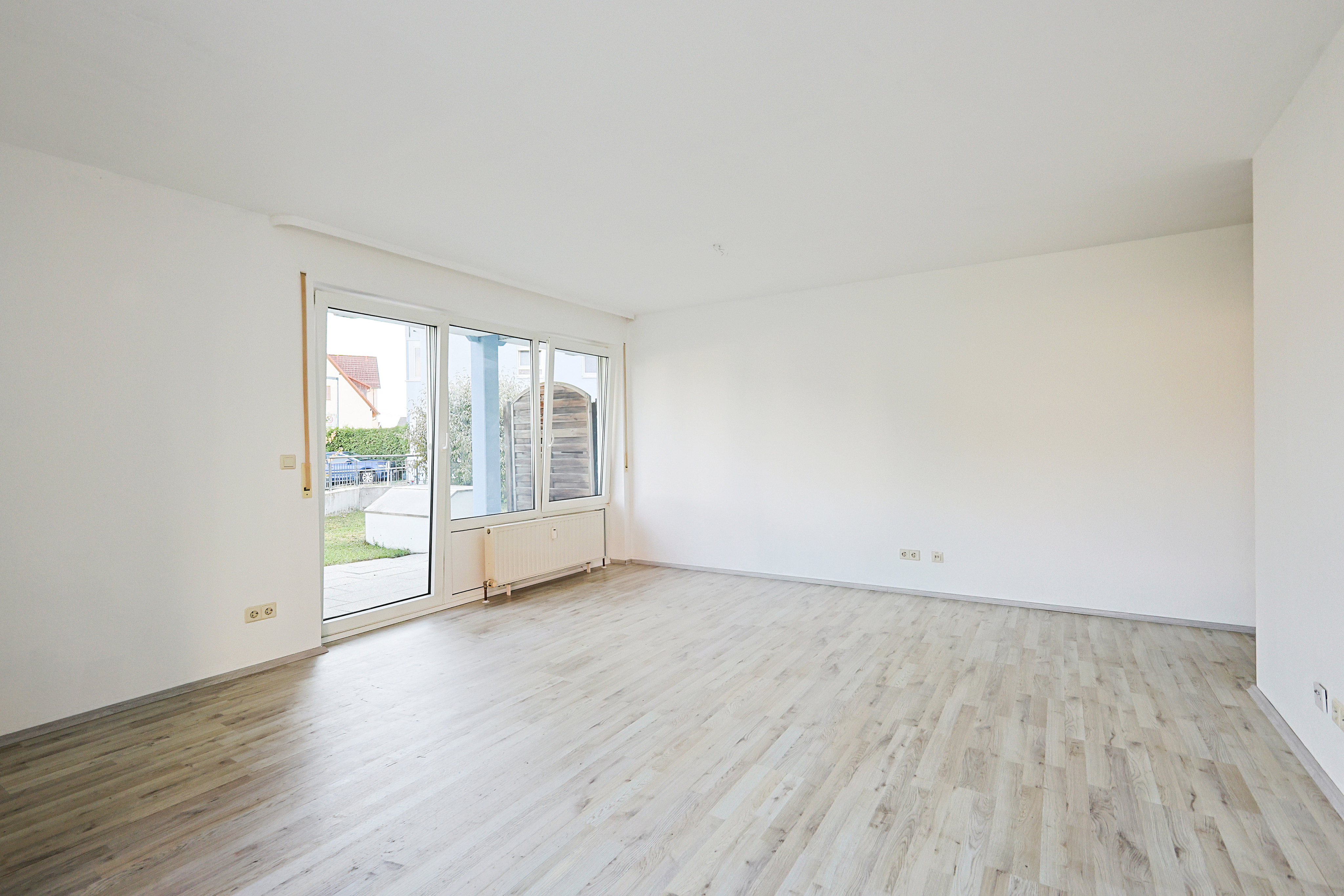 Helle 1-Zimmer-Wohnung mit sonniger Südterrasse und Gartenanteil