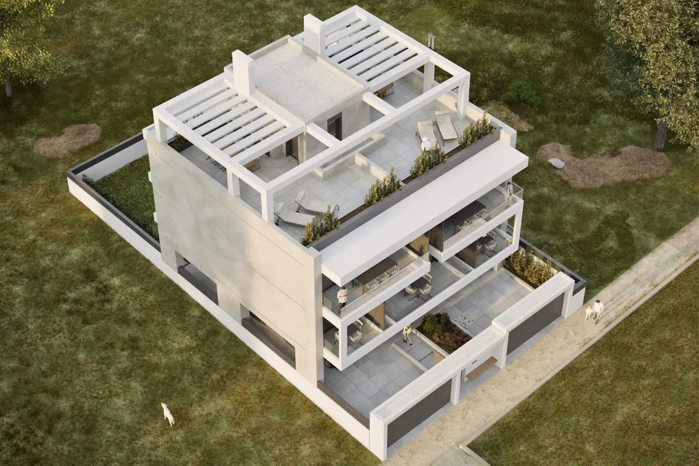 Aerial view of a modern, multi-story white building with balconies and rooftop terraces, surrounded by green lawn.