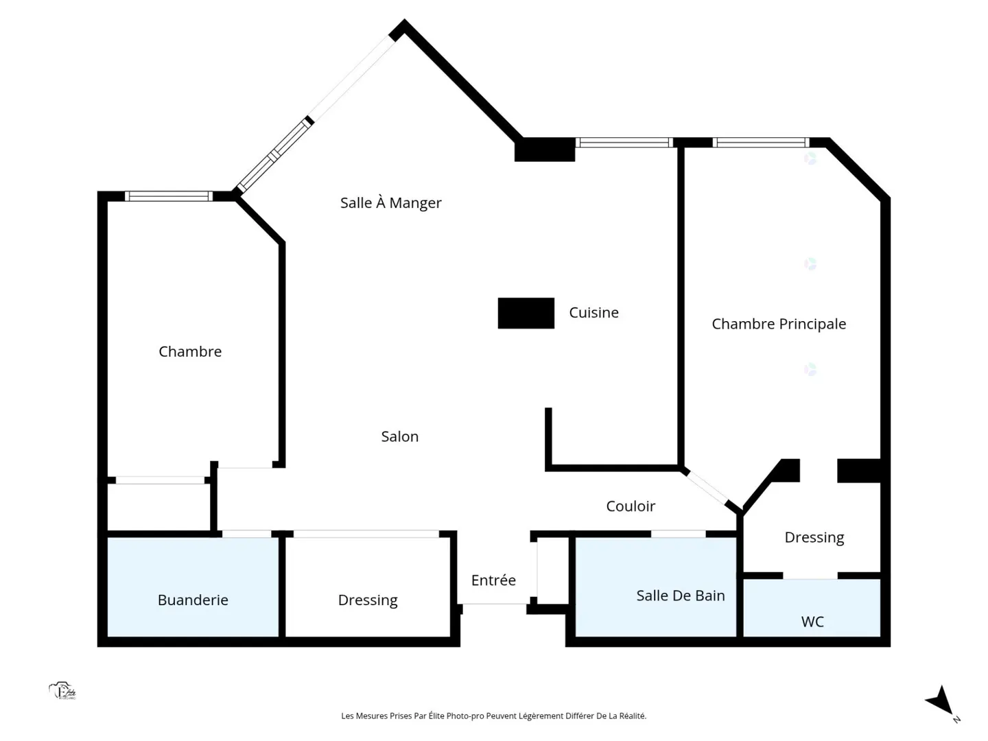 Floor plan of a home with a kitchen, living room, two bedrooms, two bathrooms, and a laundry room.