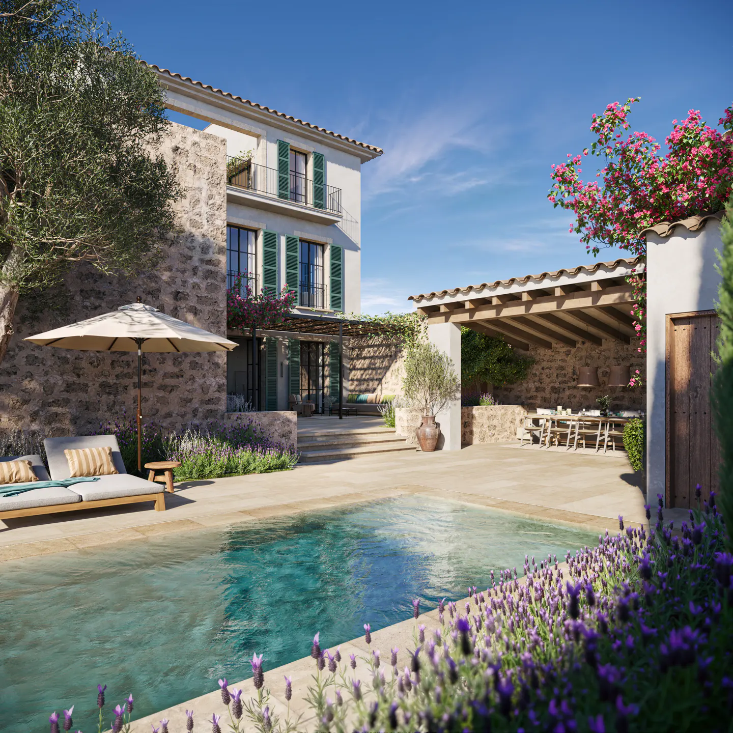 Luxury home exterior with a pool, lounge chairs, and outdoor dining area. The house has stone walls and green shutters. Lavender flowers line the pool.