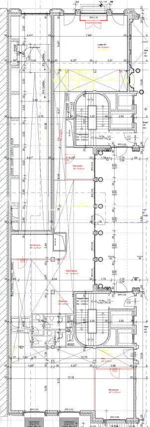 Architectural blueprint of a multi-story building, featuring detailed floor plans, dimensions, and room layouts in black lines on a white background.