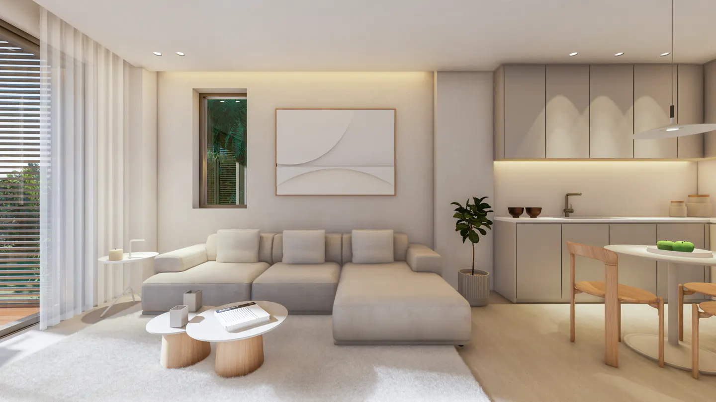 Bright, modern living room with a white sectional sofa, round coffee tables, and a view of greenery through a window. Neutral tones dominate the decor.
