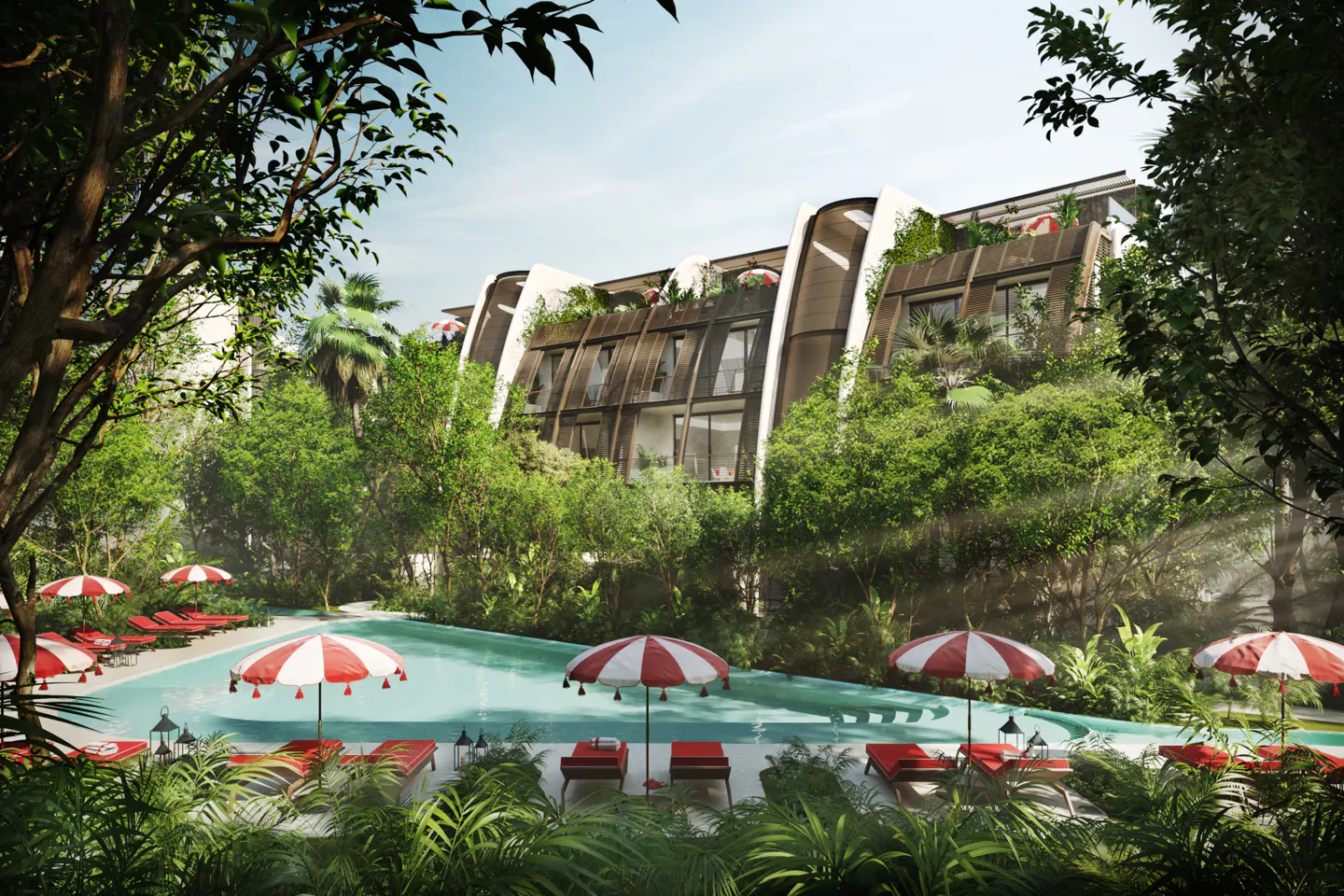 A luxury resort with a pool, red and white umbrellas, and lounge chairs surrounded by lush greenery. The building has a modern design.