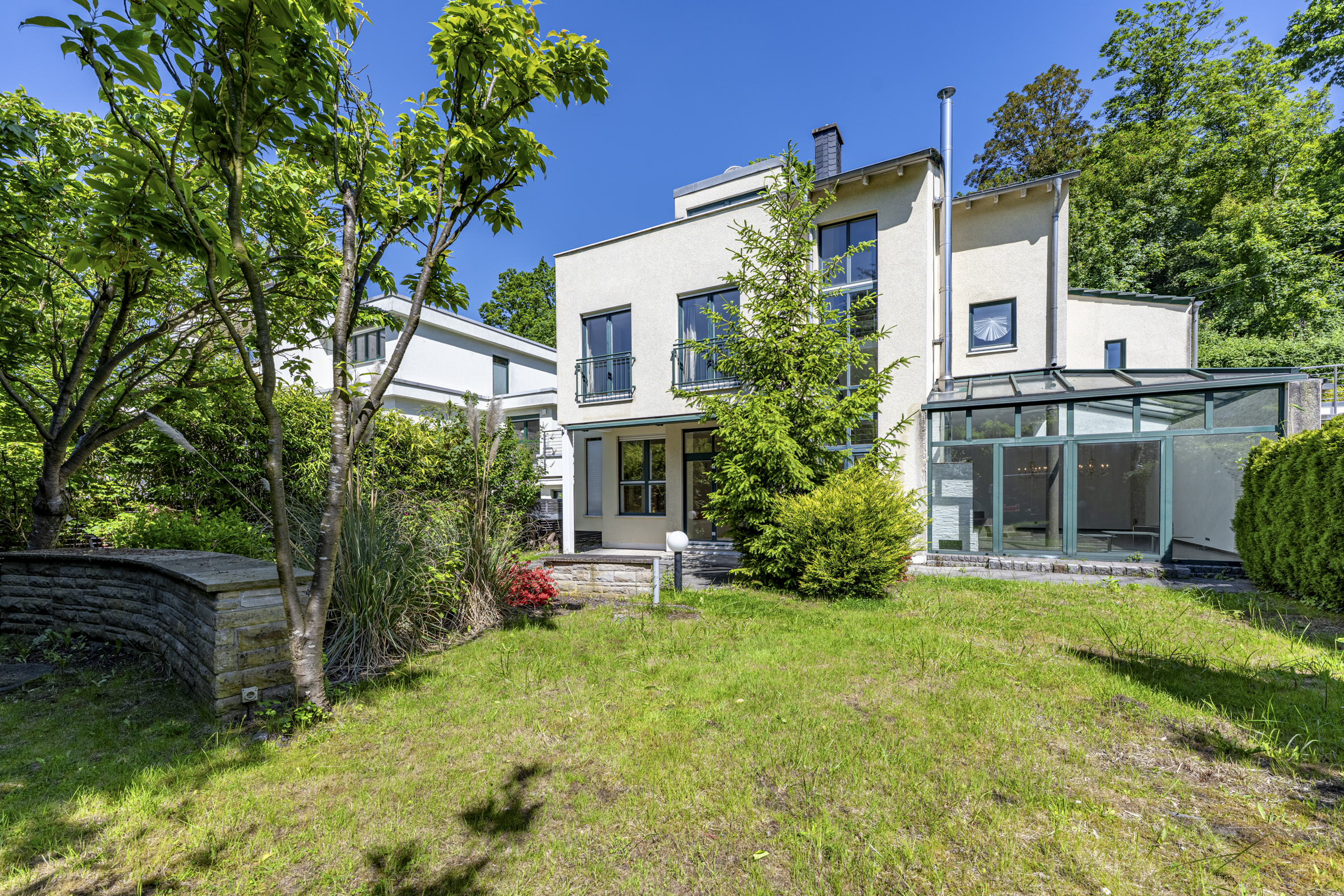 Wohnen im Grünen: Exklusives Architektenhaus mit Einliegerwohnung in Bochum-Dahlhausen