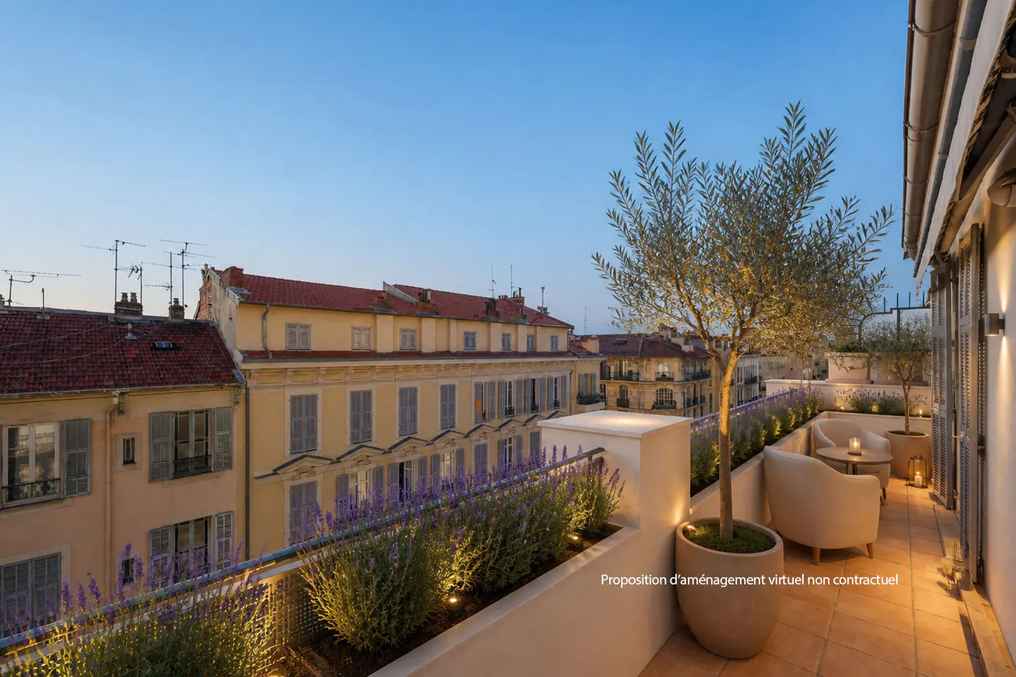 A rooftop terrace with potted olive trees, lavender, and seating overlooks a European city at dusk.