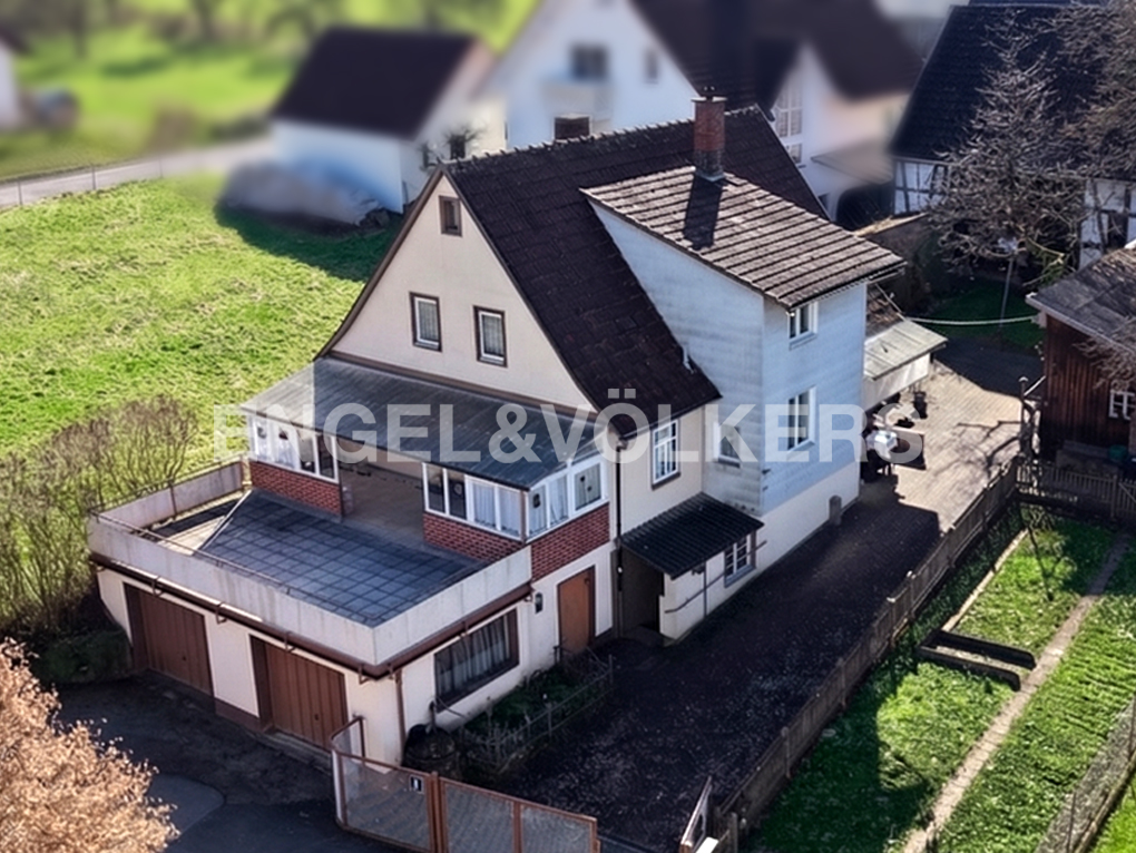 Familienfreundliches freistehendes Einfamilienhaus mit Sanierungsbedarf