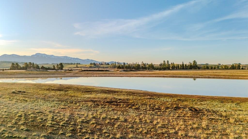 4 Acres Positioned Along The Edge Of A Peaceful Private Lake