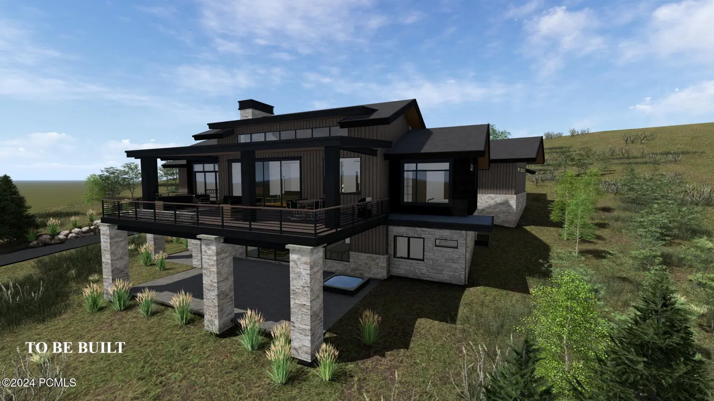 Rendering of a modern, two-story home with a black exterior and stone accents, set on a grassy hillside under a blue sky. "TO BE BUILT" is overlaid.