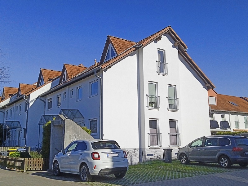 Charmante Maisonette-Wohnung mit Balkon und Tiefgaragen-Stellplatz